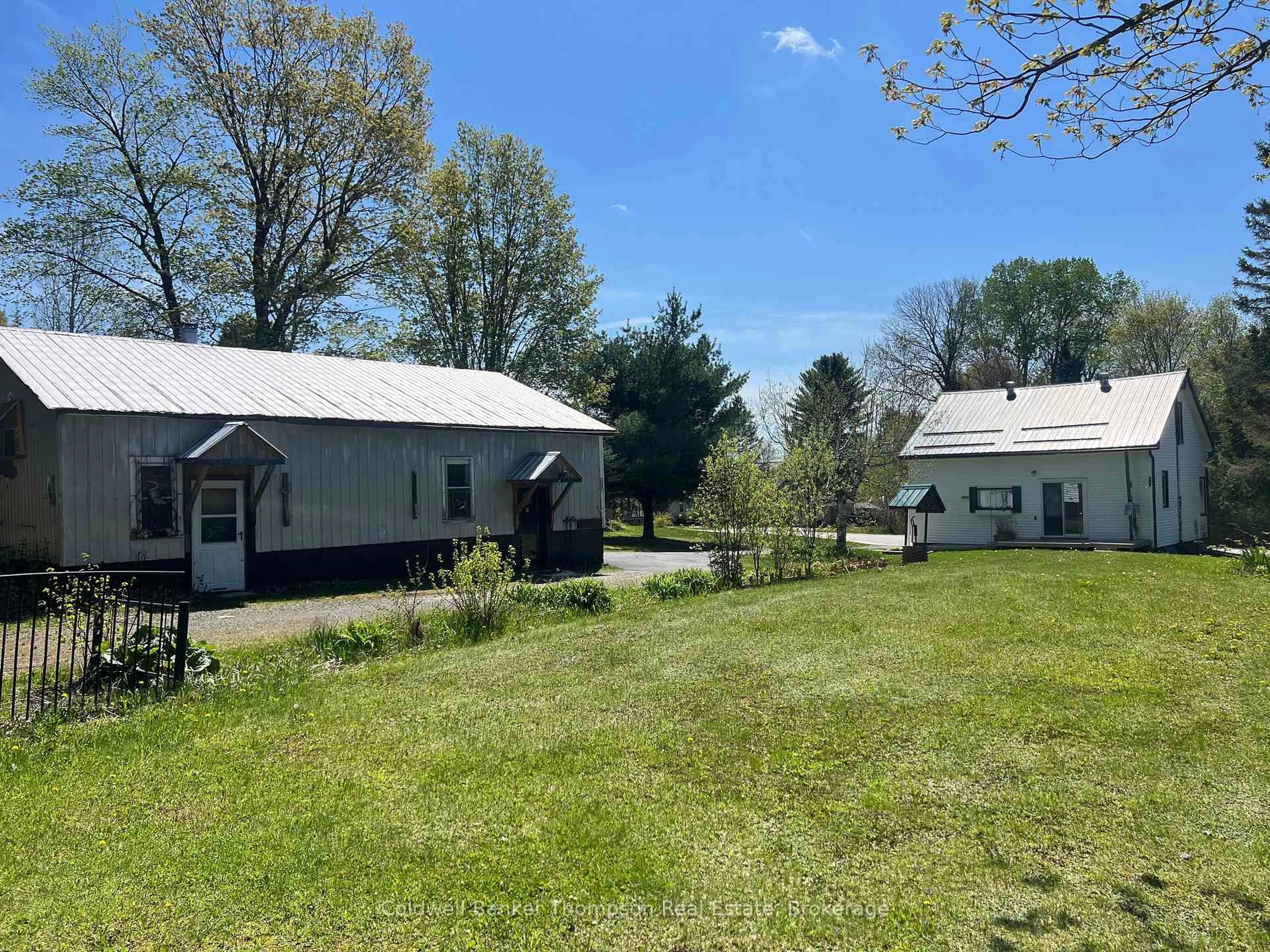 A pic from outside/outdoor area/front of a property/back of a property/a pic from drone, street for 37 Eagle Lake Rd, South River Ontario P0A 1X0