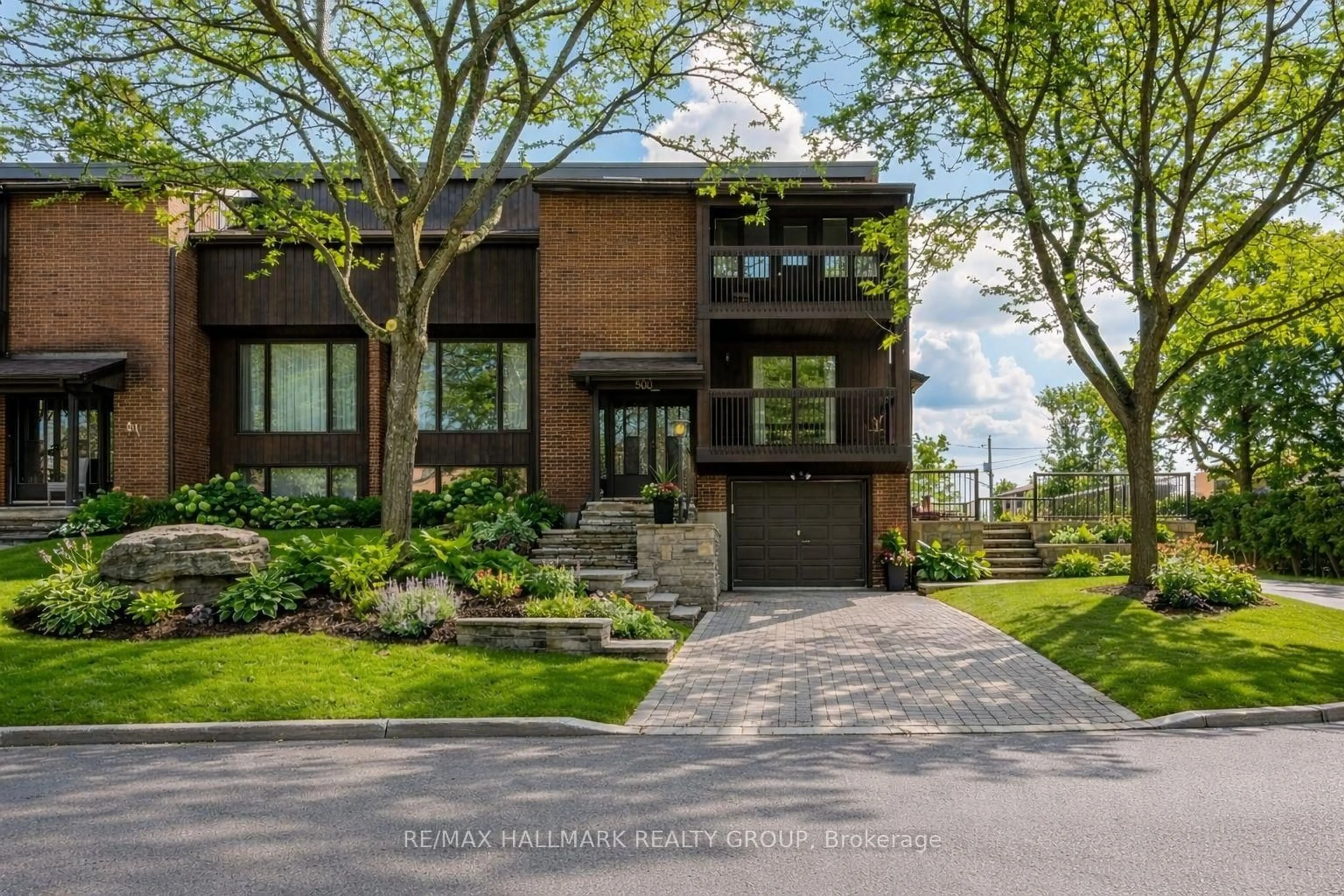 Home with brick exterior material, street for 500 Foxview Pl, Ottawa Ontario K1K 4C4