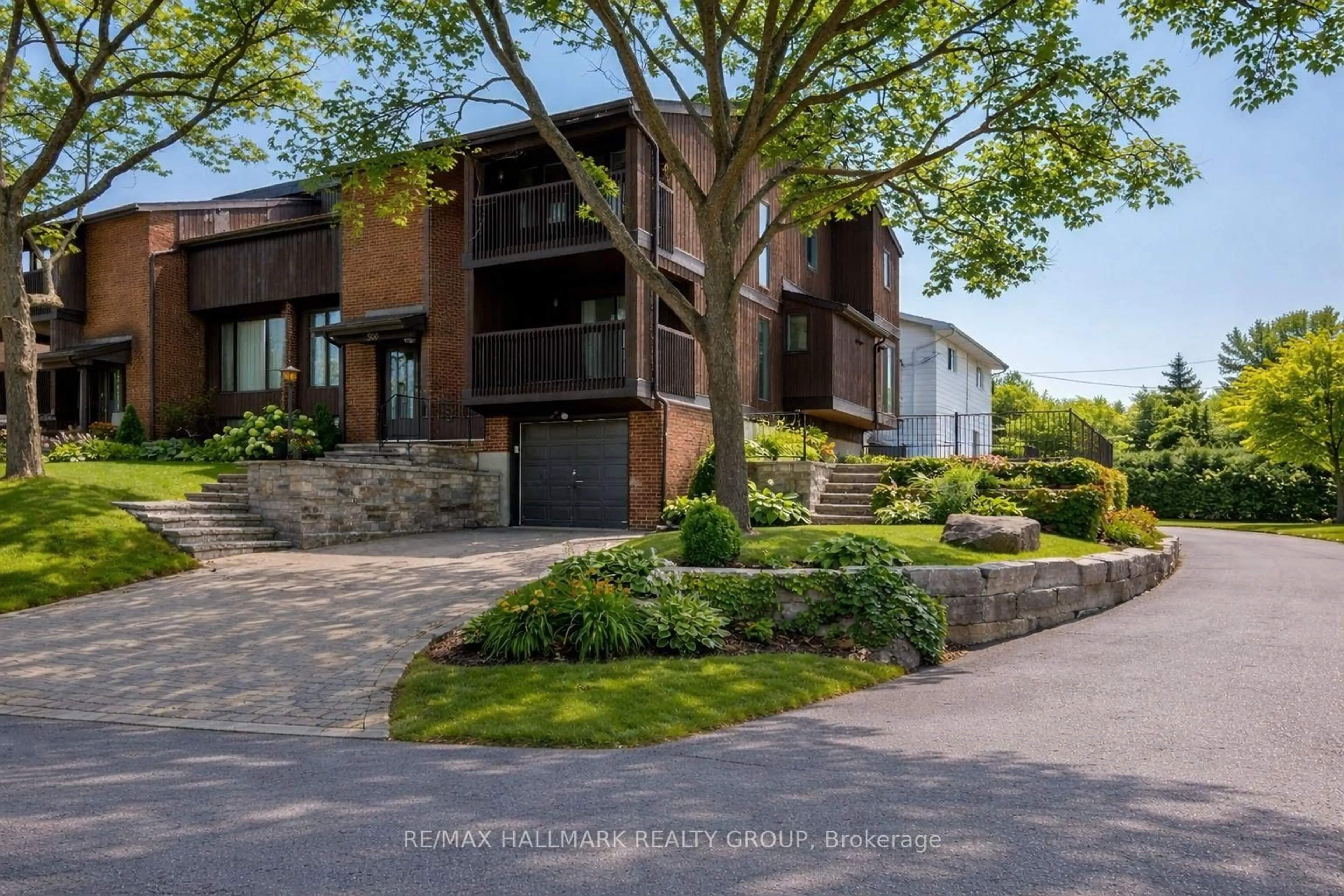 Home with brick exterior material, street for 500 Foxview Pl, Ottawa Ontario K1K 4C4