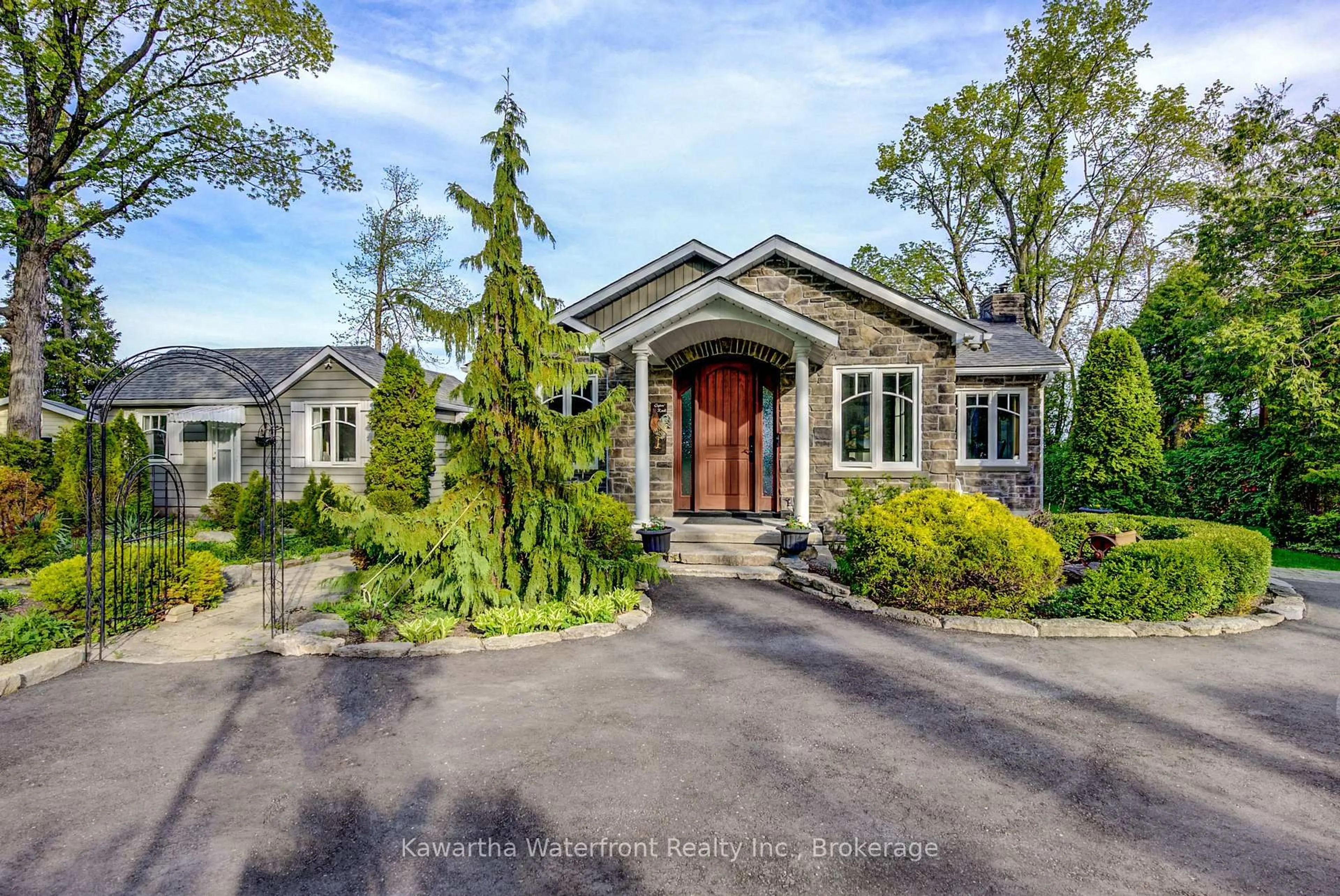 Home with brick exterior material, street for 48 Maple Ave, Kawartha Lakes Ontario K0M 2B0