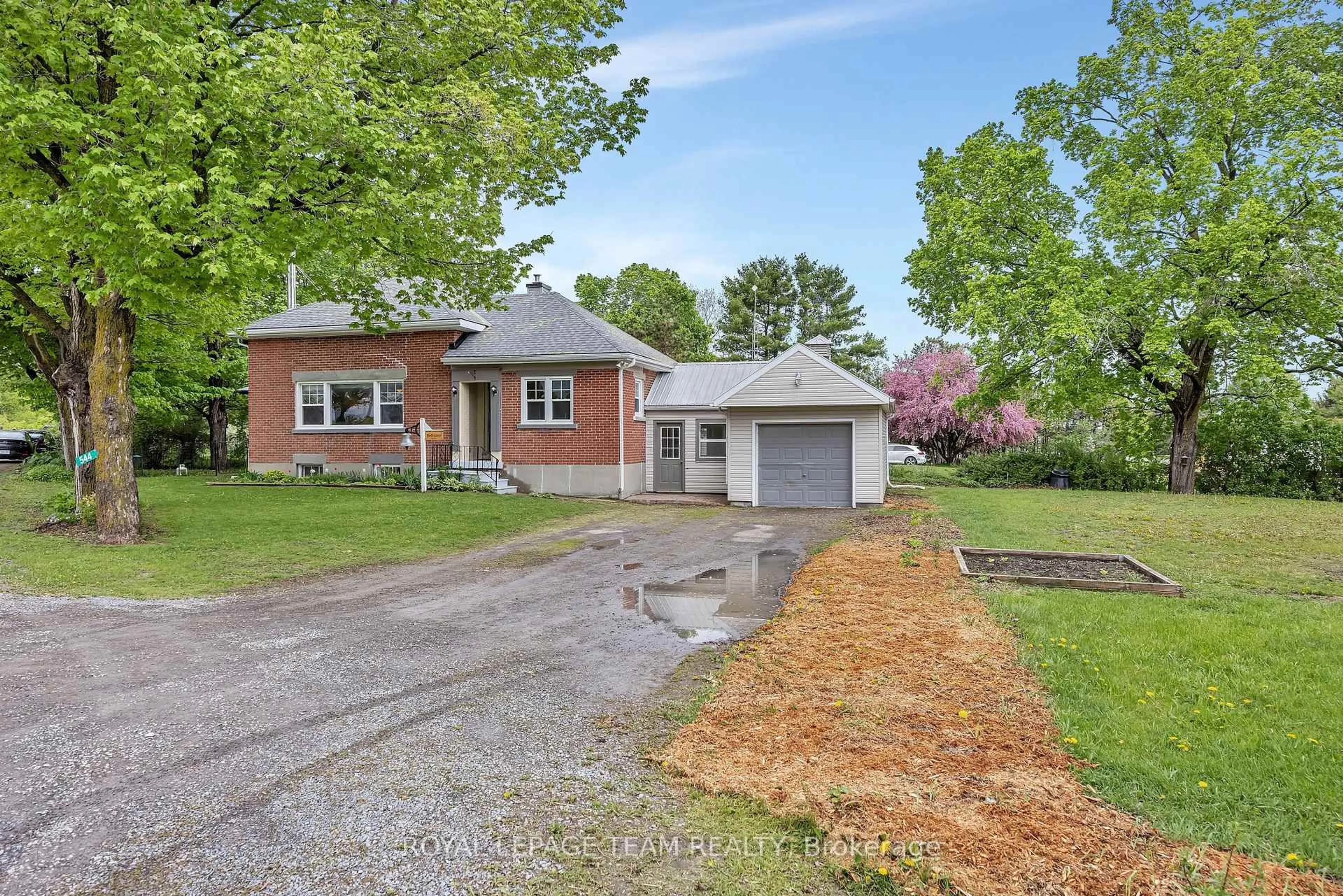 Home with brick exterior material, street for 544 Old Coach Rd, Carp Ontario K0A 1L0