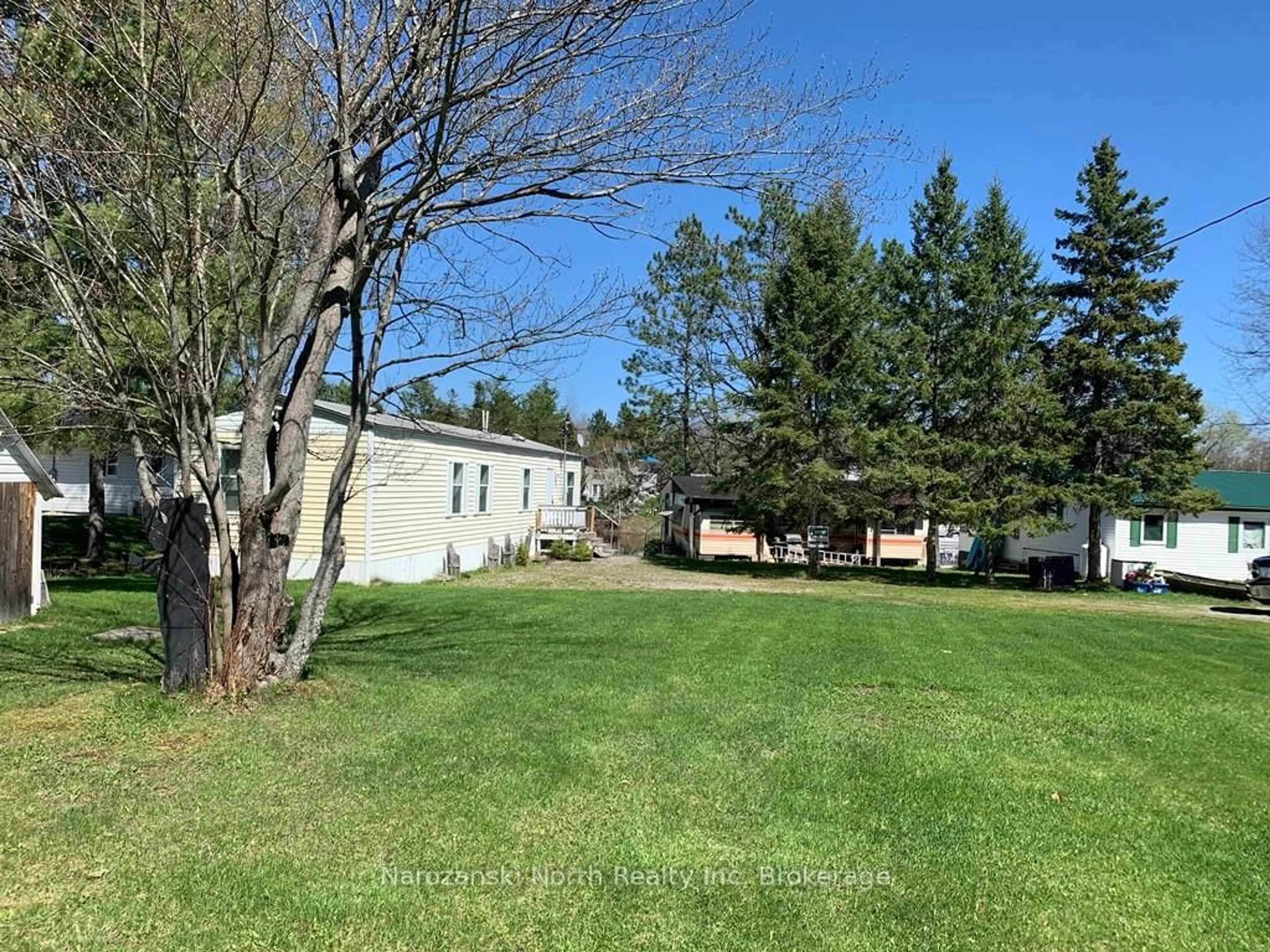 A pic from outside/outdoor area/front of a property/back of a property/a pic from drone, unknown for 124 D Cloutier Rd, St. Charles Ontario P0M 1G0