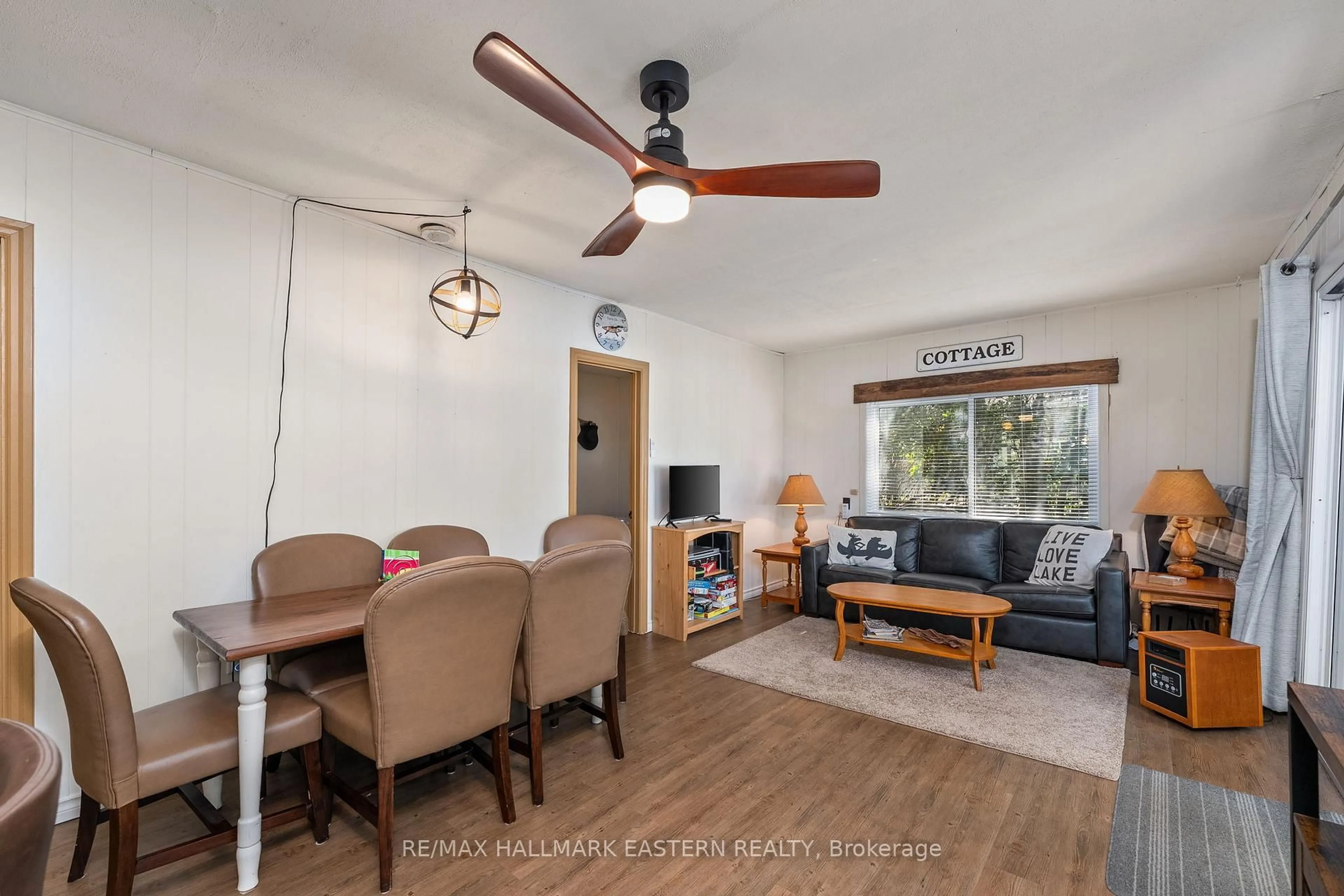 Living room with furniture, wood/laminate floor for 362 7th Line Rd #134, Alnwick/Haldimand Ontario K0K 2X0