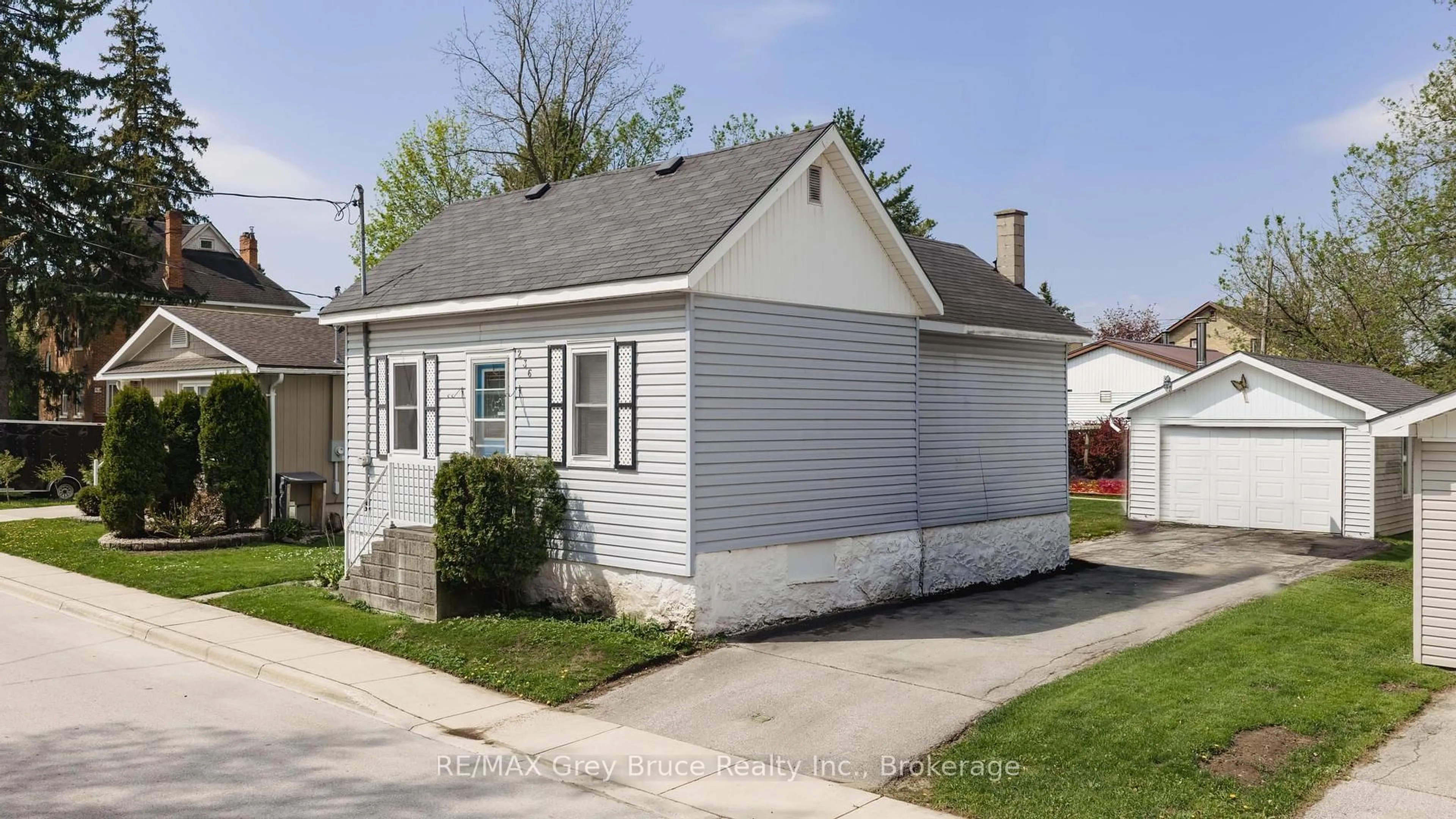 Home with vinyl exterior material, street for 236 2nd Ave, Arran-Elderslie Ontario N0G 1L0
