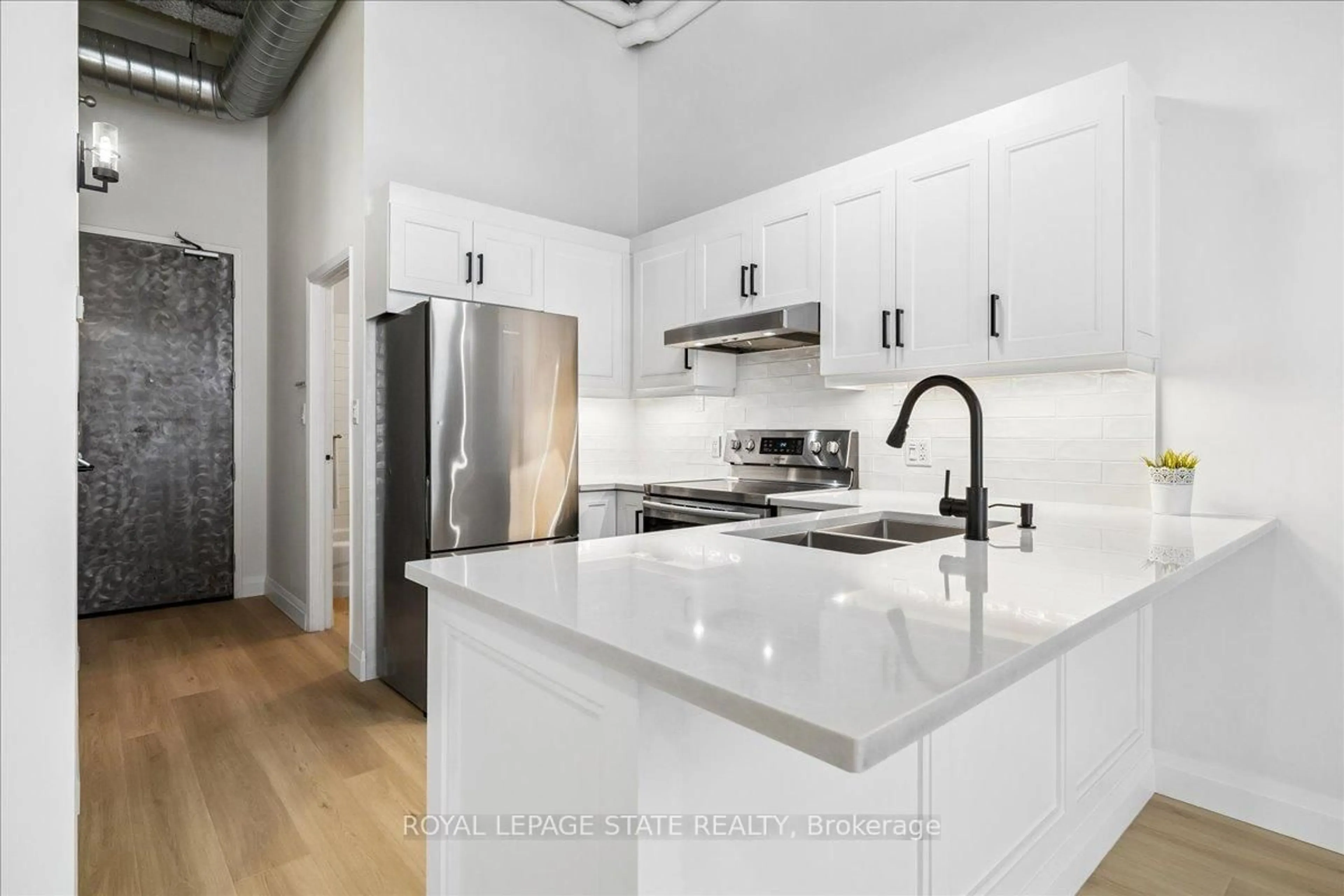 Open concept kitchen, unknown for 11 Rebecca St #105, Hamilton Ontario L8R 3H7