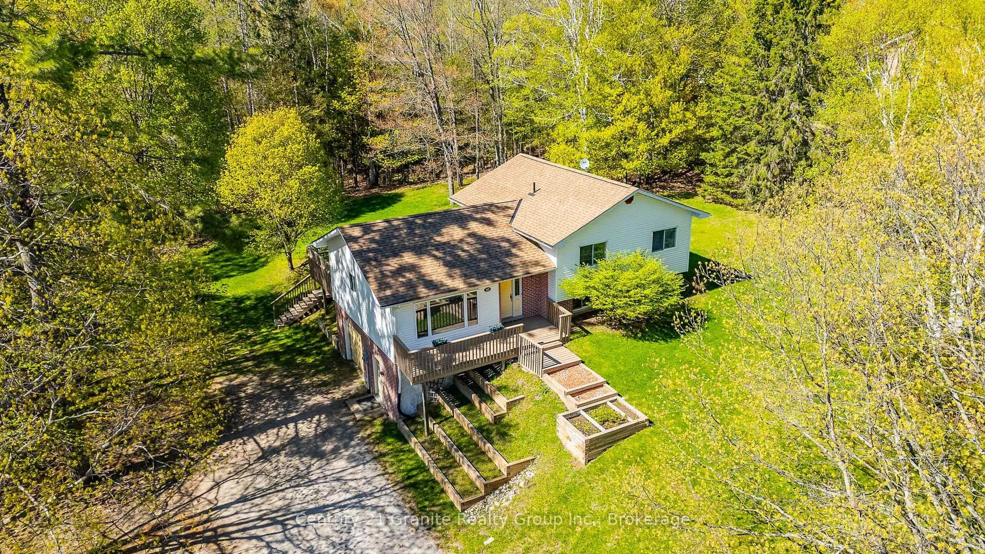 A pic from outside/outdoor area/front of a property/back of a property/a pic from drone, unknown for 117 Riverside Dr, Dysart et al Ontario K0M 1S0