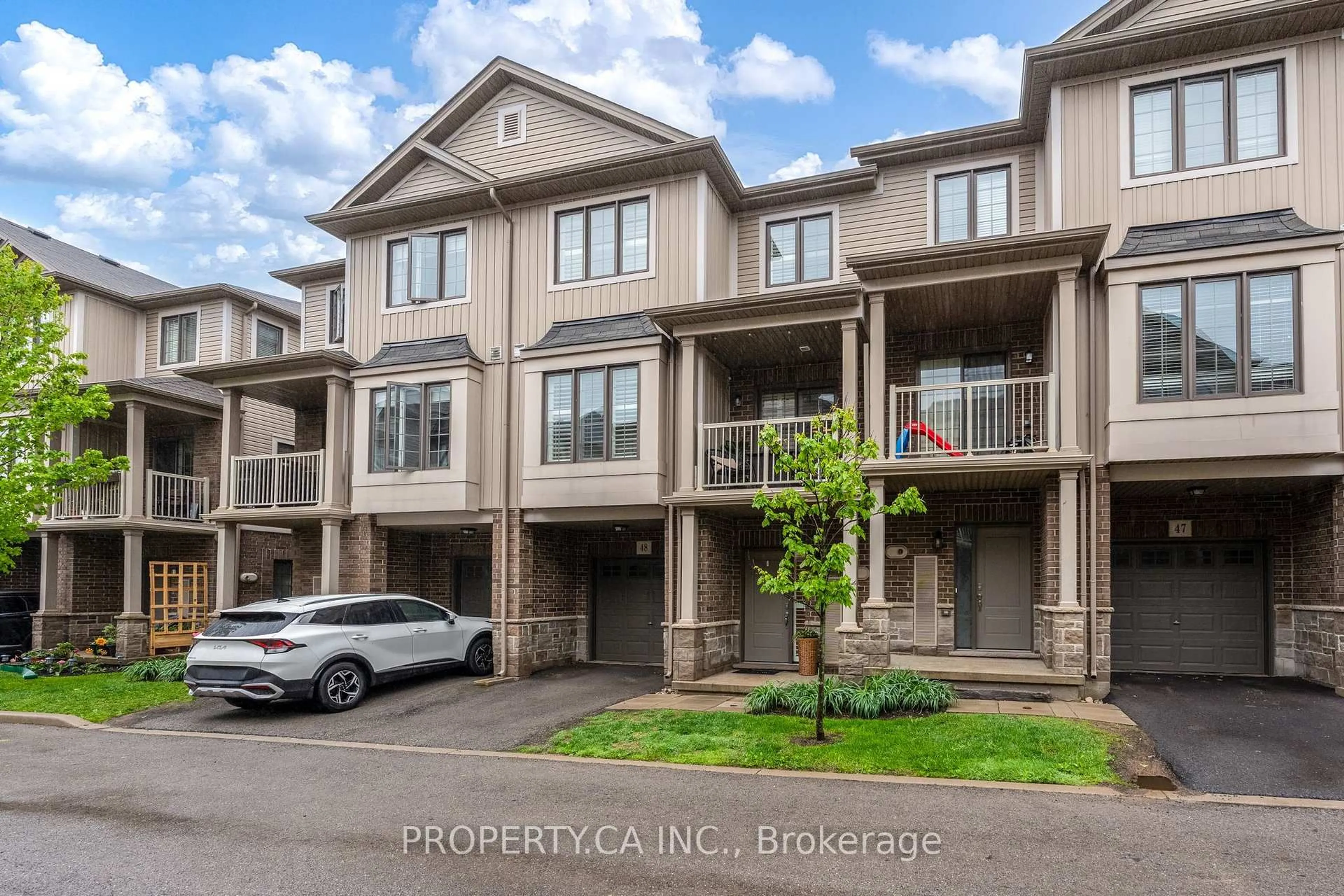 A pic from outside/outdoor area/front of a property/back of a property/a pic from drone, street for 377 Glancaster Rd #48, Hamilton Ontario L9G 0G4
