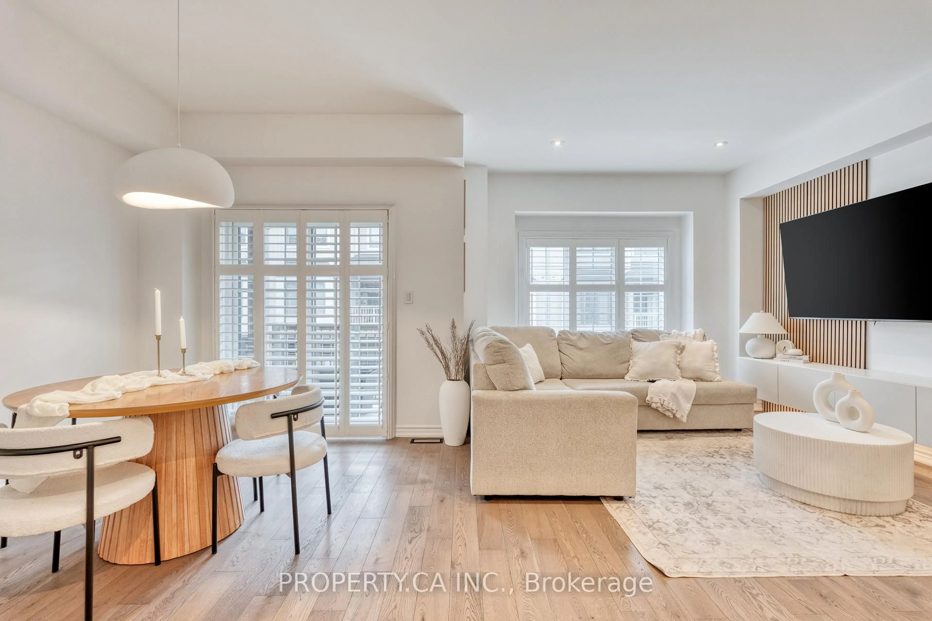 Living room with furniture, wood/laminate floor for 377 Glancaster Rd #48, Hamilton Ontario L9G 0G4