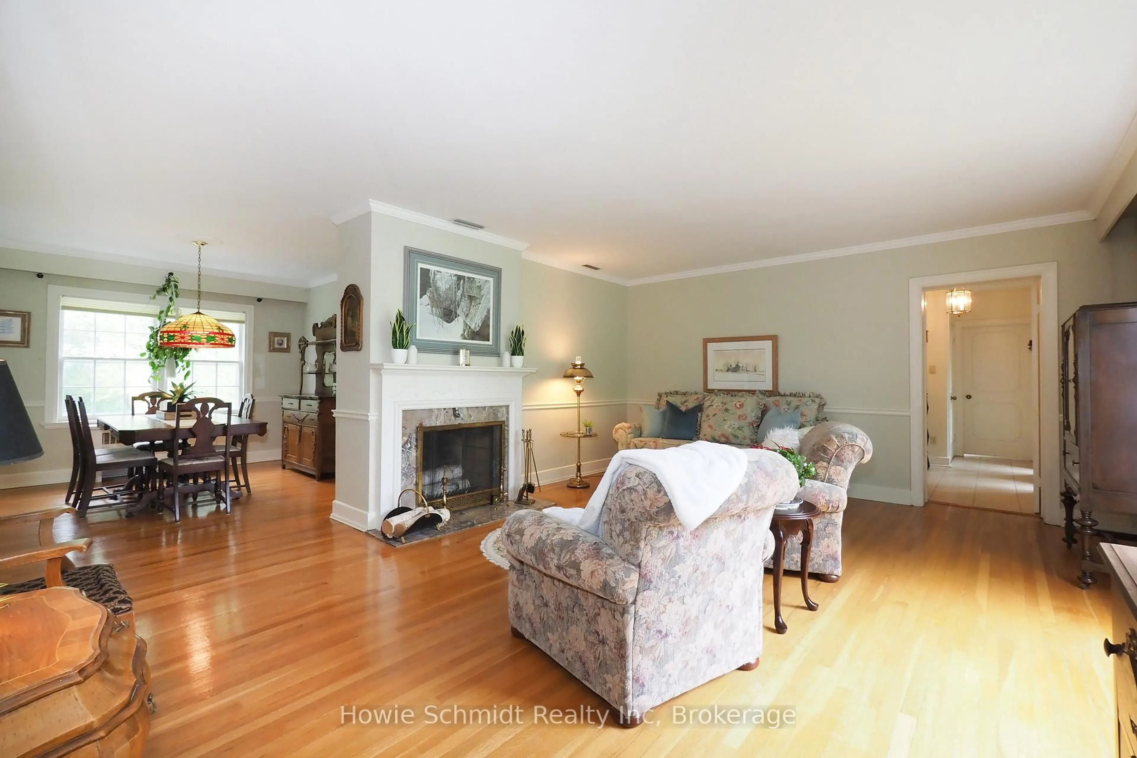 Living room with furniture, wood/laminate floor for 2023 Coronation Blvd, Cambridge Ontario N3H 3S1