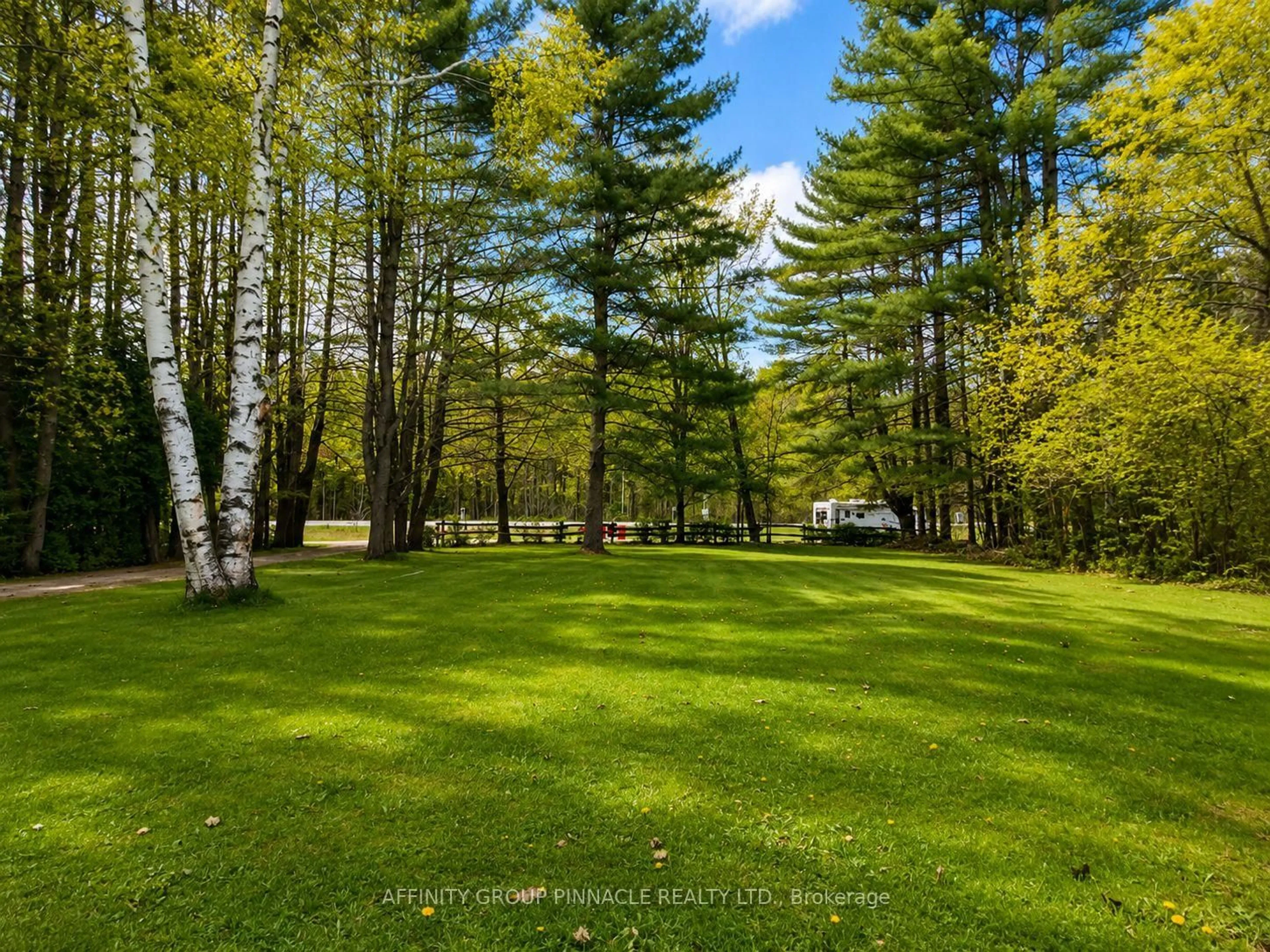 A pic from outside/outdoor area/front of a property/back of a property/a pic from drone, forest/trees view for 1150 Moore Lake Estates Rd, Minden Hills Ontario K0M 2L1