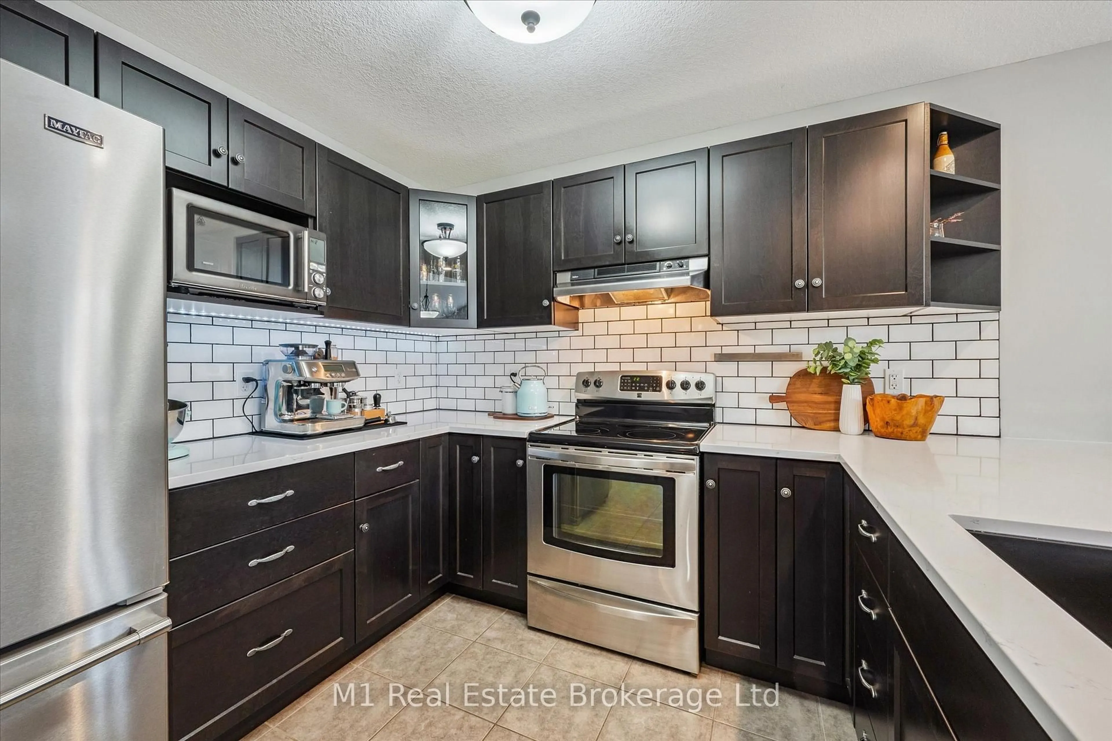 Open concept kitchen, ceramic/tile floor for 79 Spencer Dr, Centre Wellington Ontario N0B 1S0