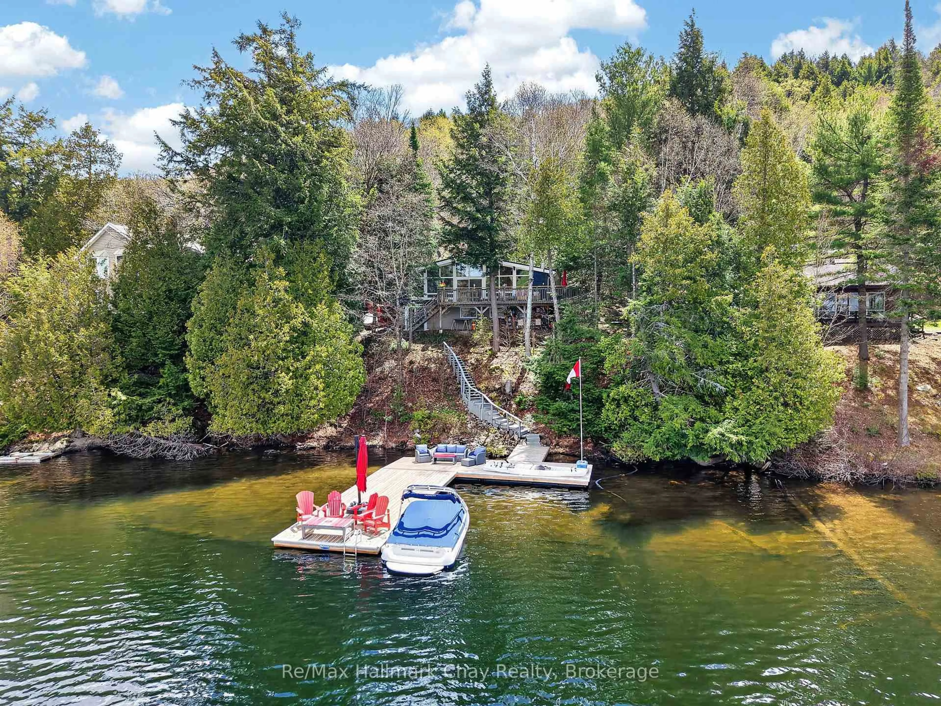 A pic from outside/outdoor area/front of a property/back of a property/a pic from drone, water/lake/river/ocean view for 1119 Narrows Rd, Lake of Bays Ontario P0B 1A0