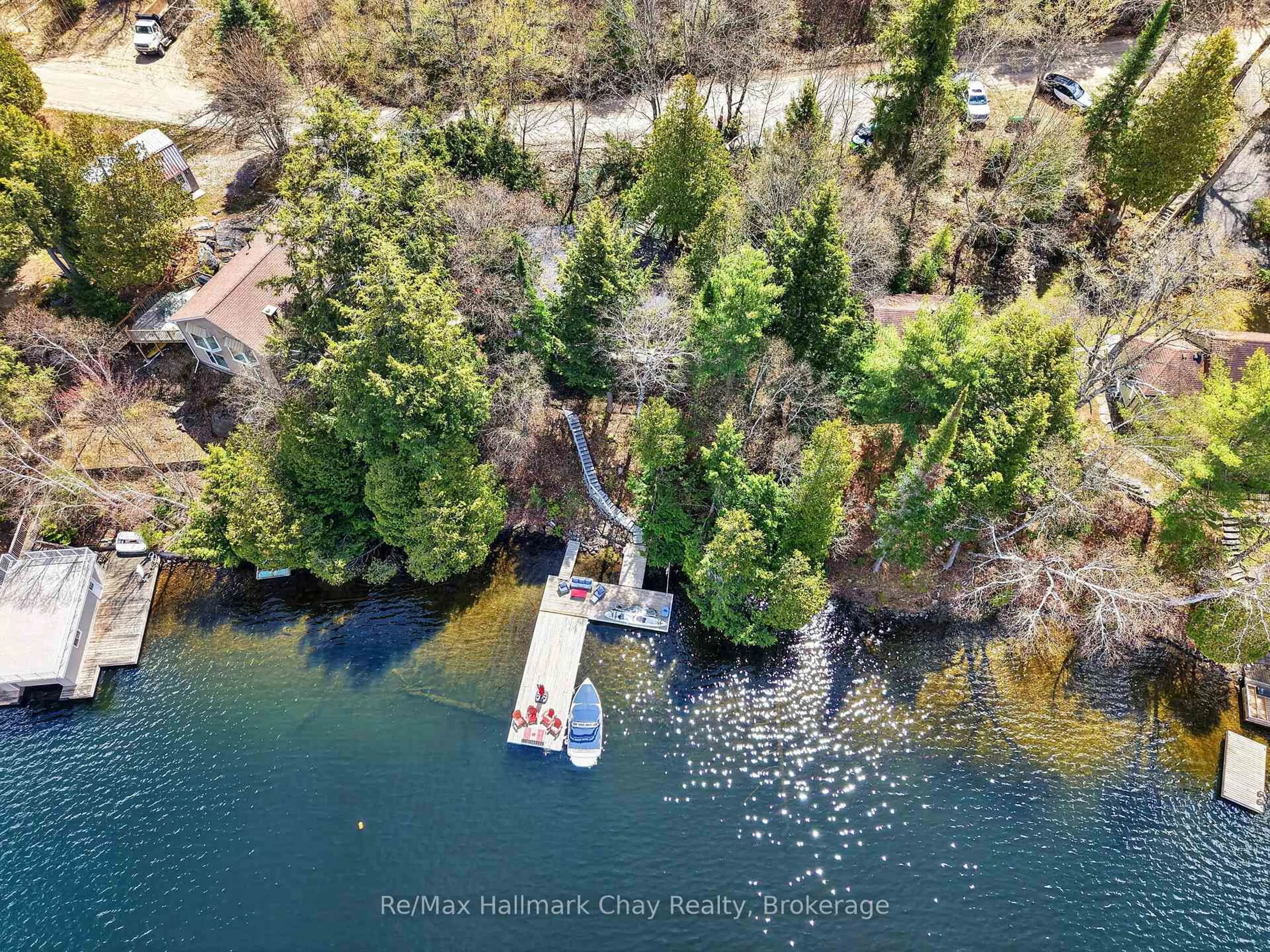 A pic from outside/outdoor area/front of a property/back of a property/a pic from drone, water/lake/river/ocean view for 1119 Narrows Rd, Lake of Bays Ontario P0B 1A0