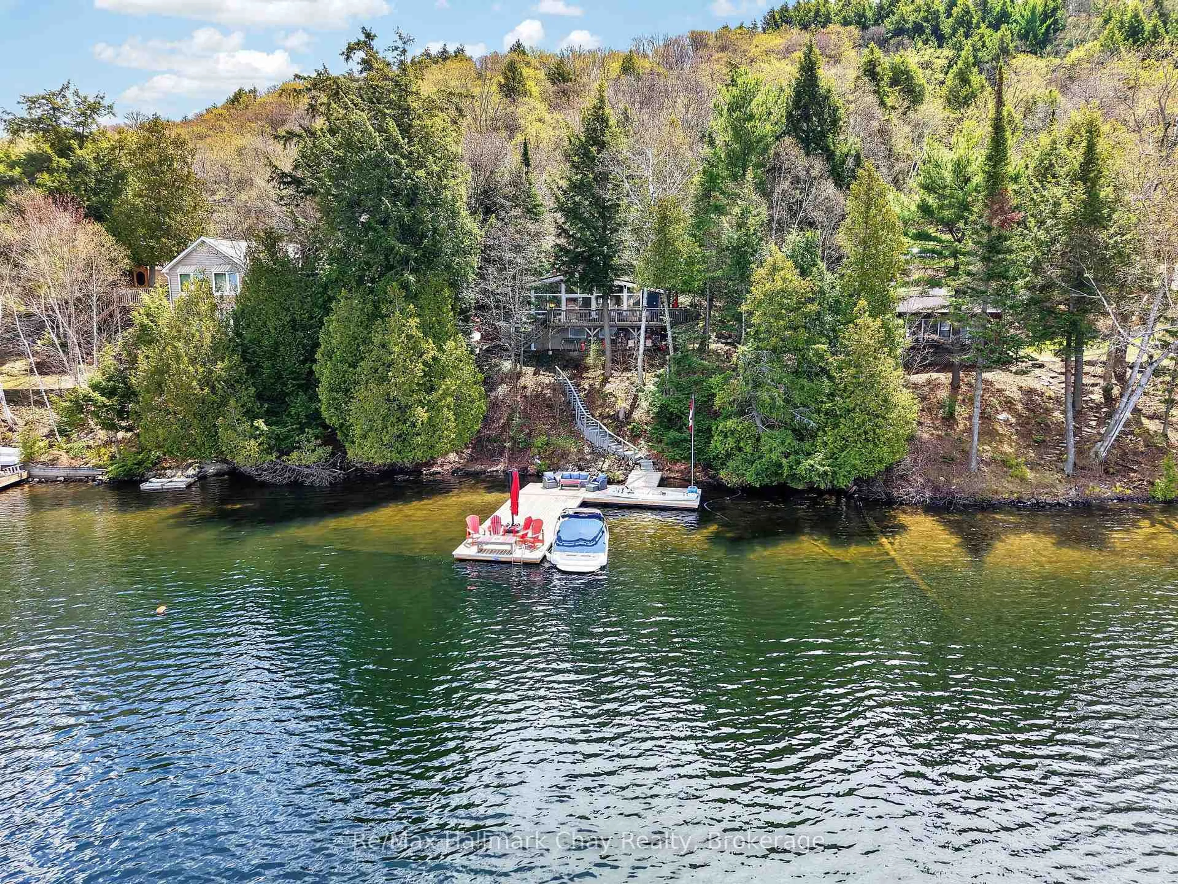 A pic from outside/outdoor area/front of a property/back of a property/a pic from drone, water/lake/river/ocean view for 1119 Narrows Rd, Lake of Bays Ontario P0B 1A0