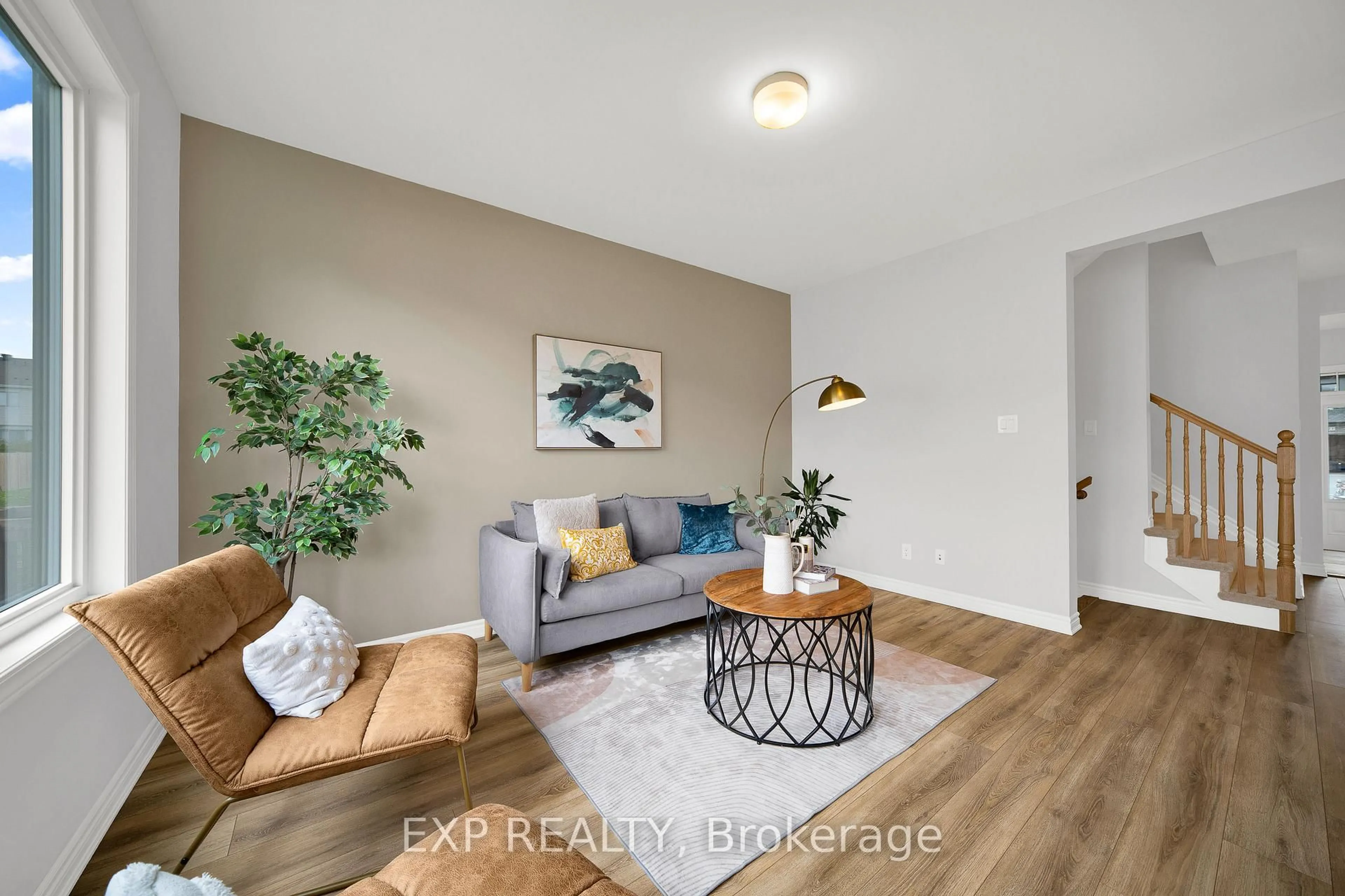 Living room with furniture, wood/laminate floor for 422 Cope Dr, Ottawa Ontario K2V 0P8