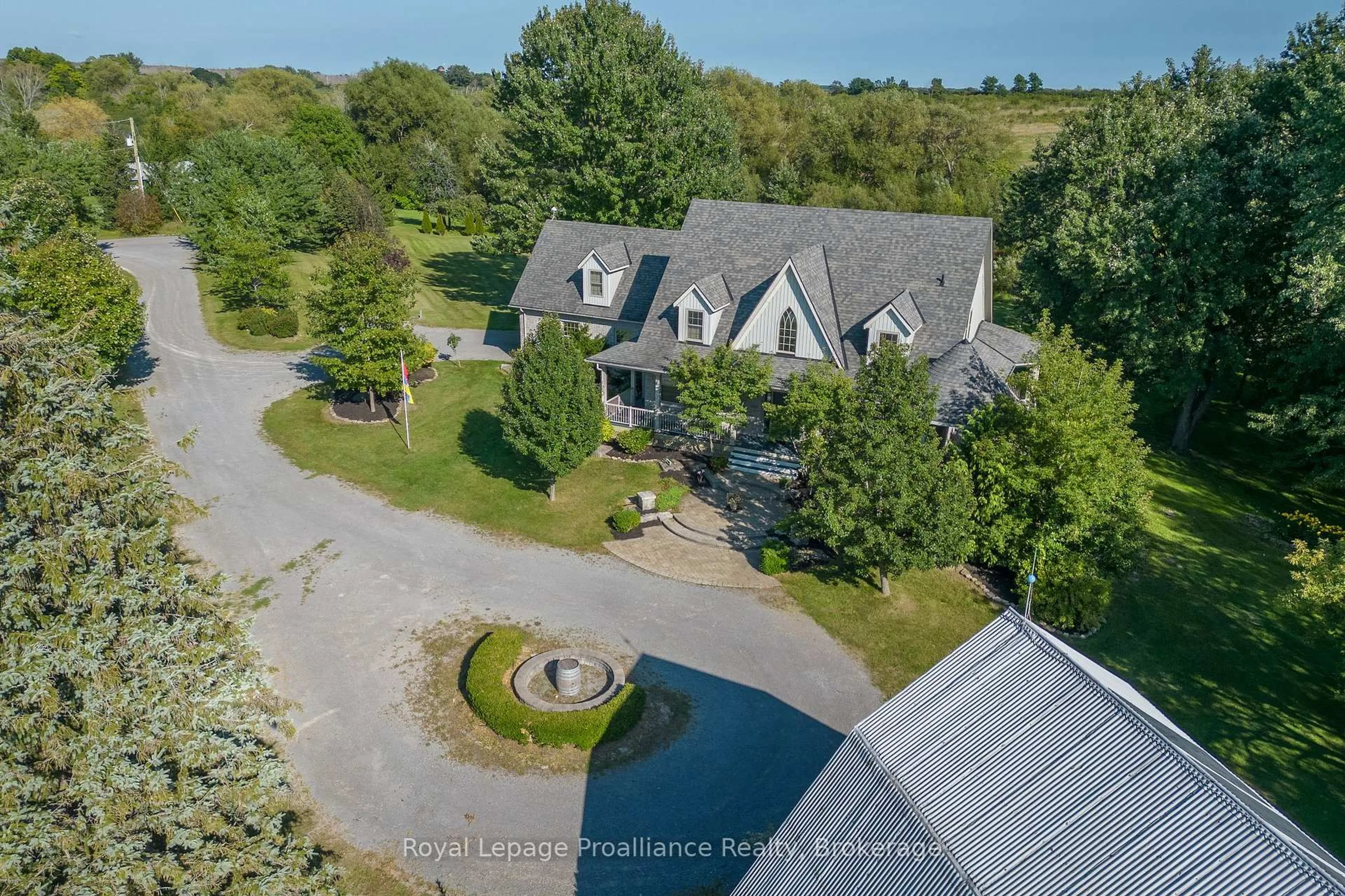 A pic from outside/outdoor area/front of a property/back of a property/a pic from drone, water/lake/river/ocean view for 46 Stapleton Rd, Prince Edward County Ontario K0K 2J0