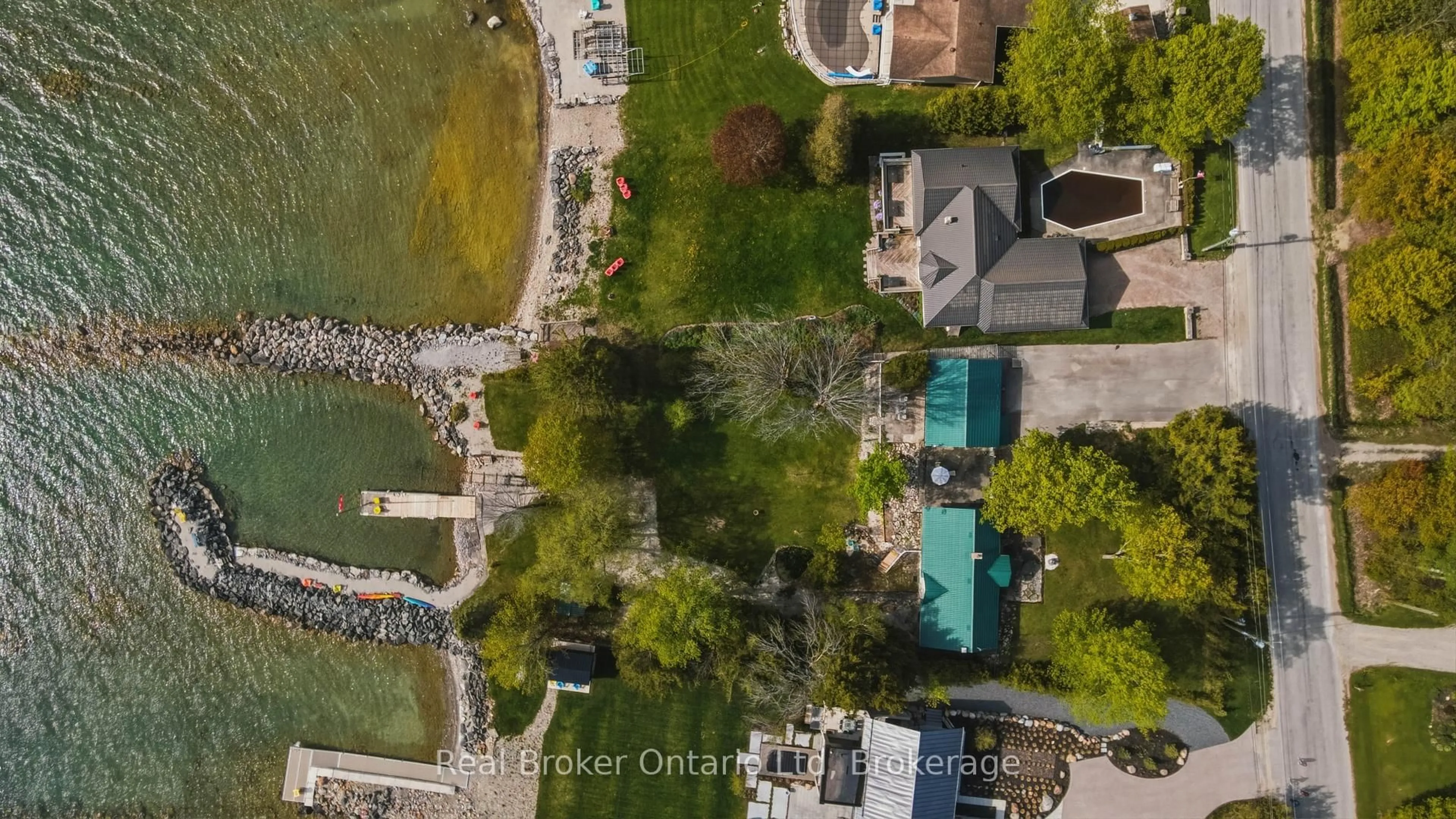 A pic from outside/outdoor area/front of a property/back of a property/a pic from drone, water/lake/river/ocean view for 275 Balmy Beach Rd, Georgian Bluffs Ontario N4K 5N4