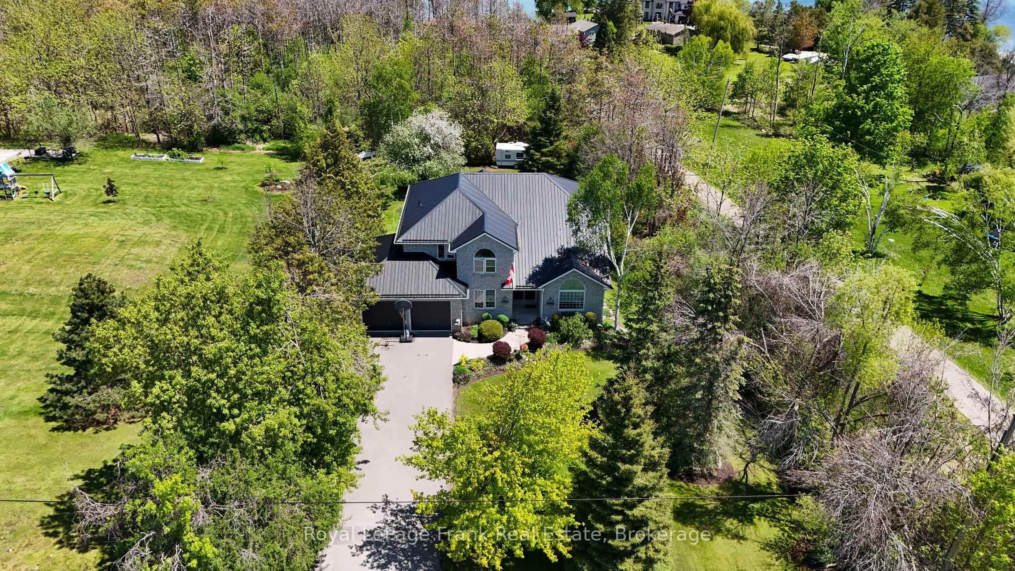 A pic from outside/outdoor area/front of a property/back of a property/a pic from drone, street for 609 Brick Rd, Selwyn Ontario K0L 1T0