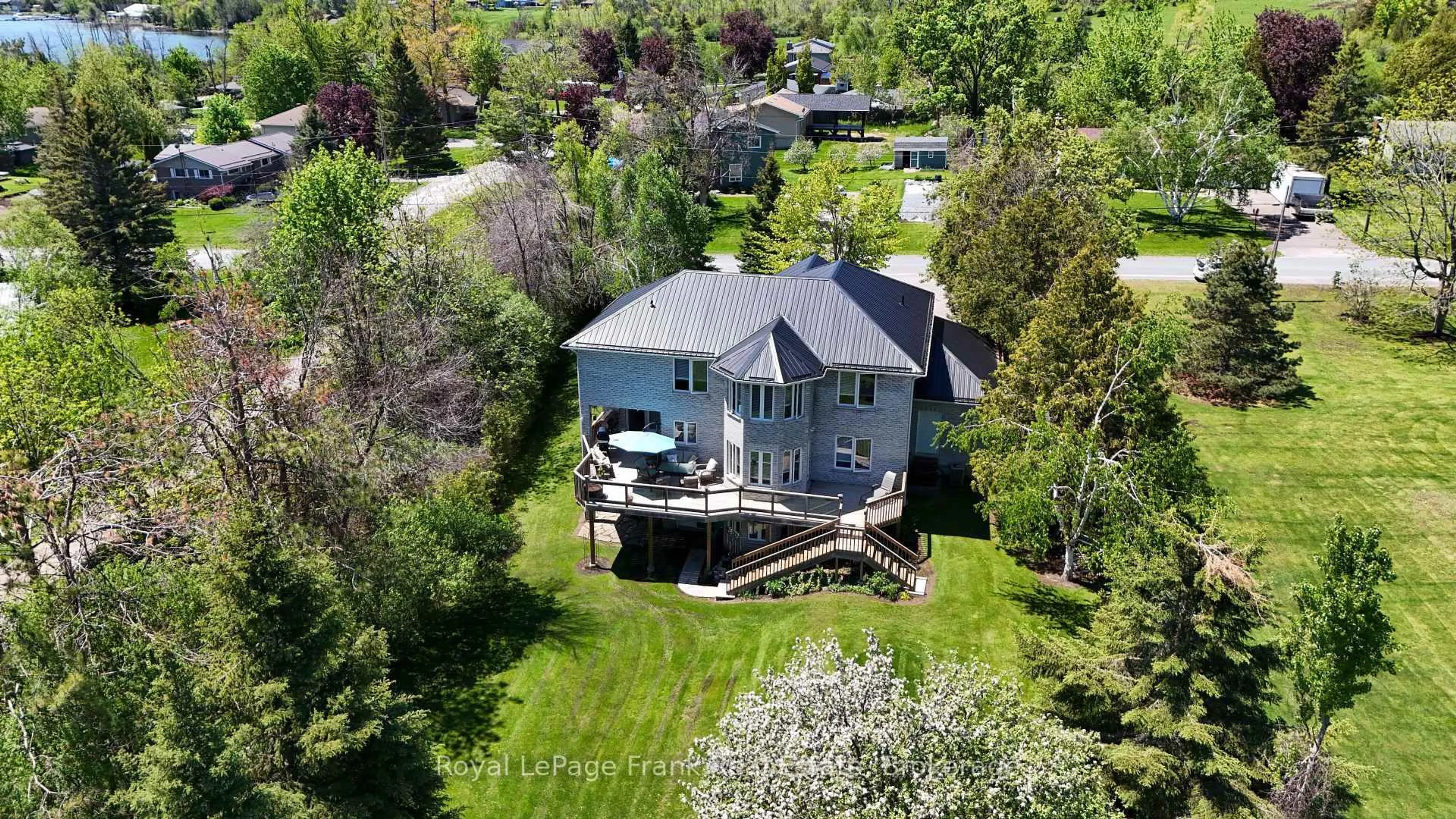 A pic from outside/outdoor area/front of a property/back of a property/a pic from drone, water/lake/river/ocean view for 609 Brick Rd, Selwyn Ontario K0L 1T0