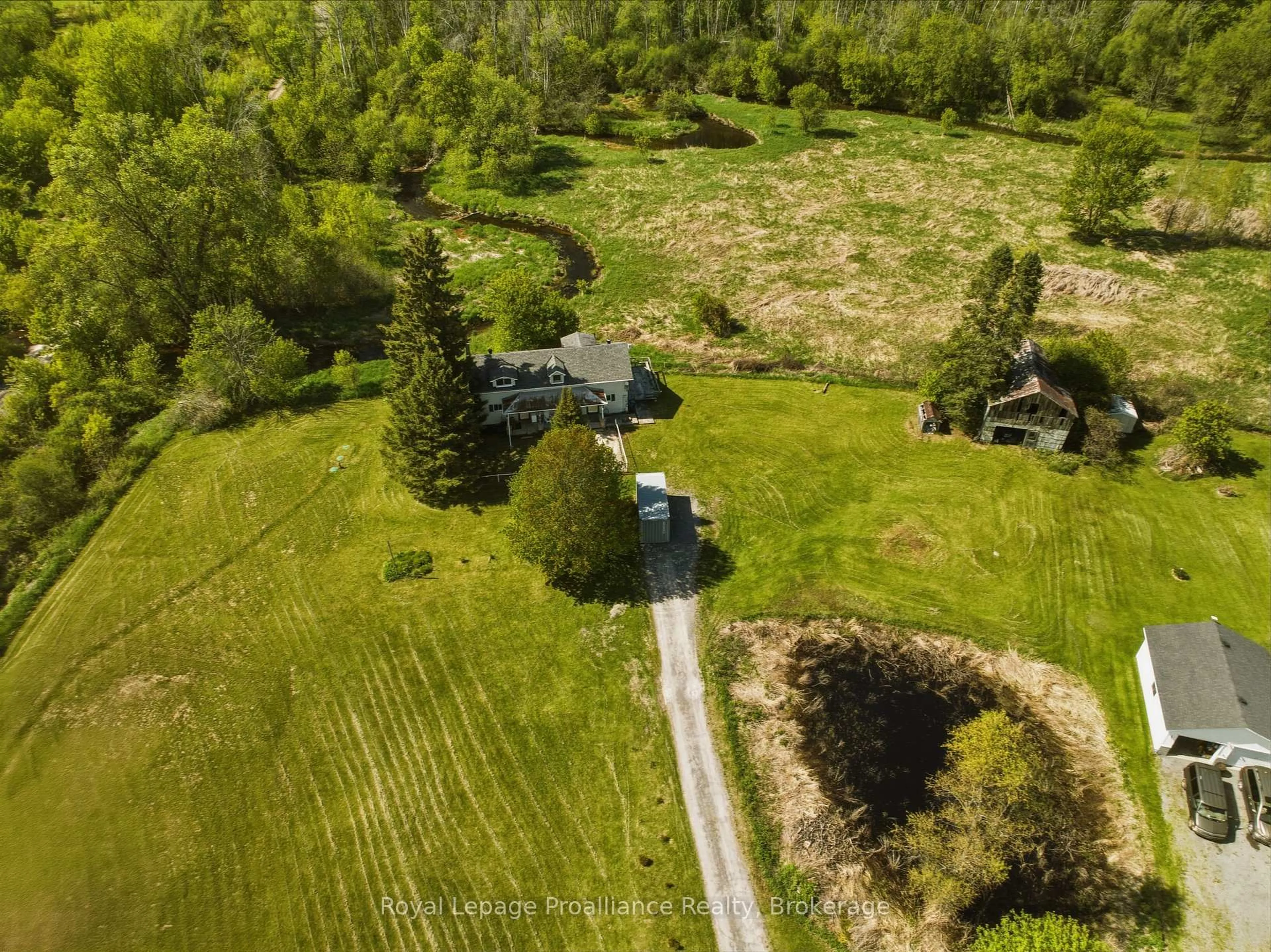 A pic from outside/outdoor area/front of a property/back of a property/a pic from drone, forest/trees view for 842 Frankford Rd, Quinte West Ontario K0K 2B0