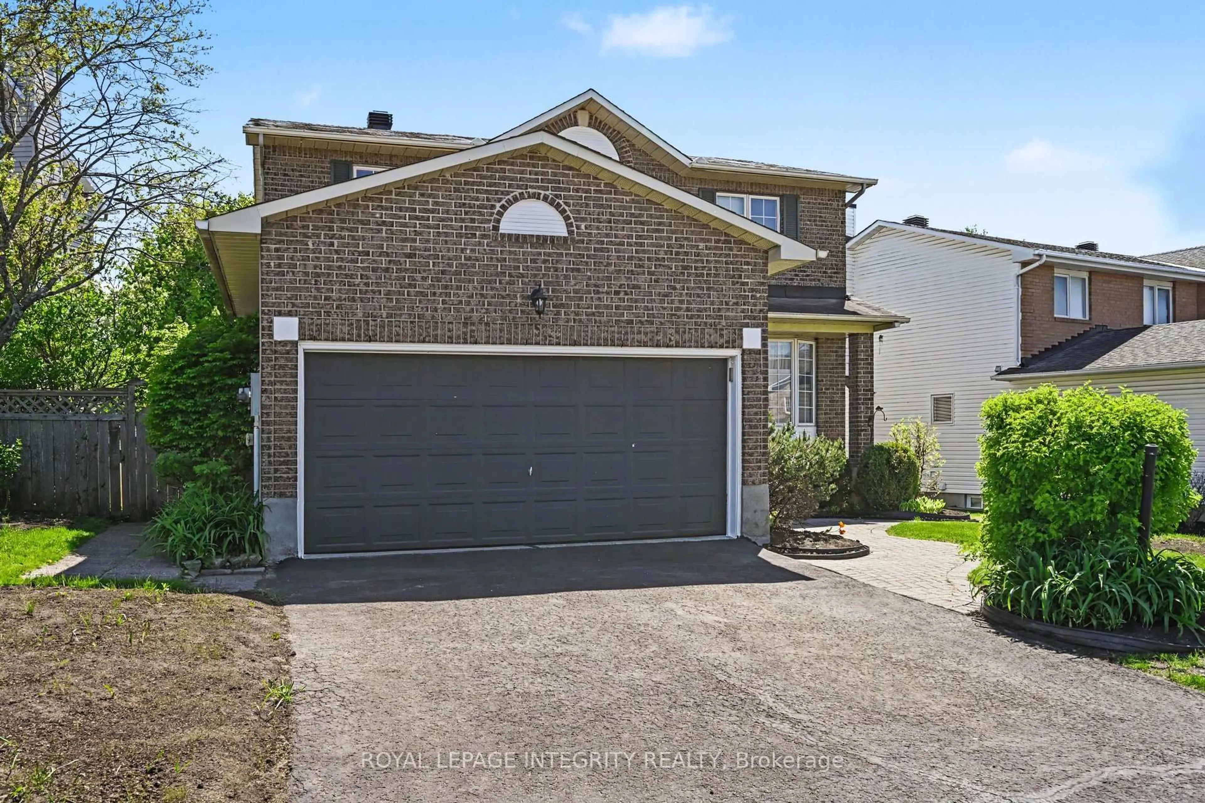 Home with brick exterior material, street for 168 Springwater Dr, Kanata Ontario K2M 2A1