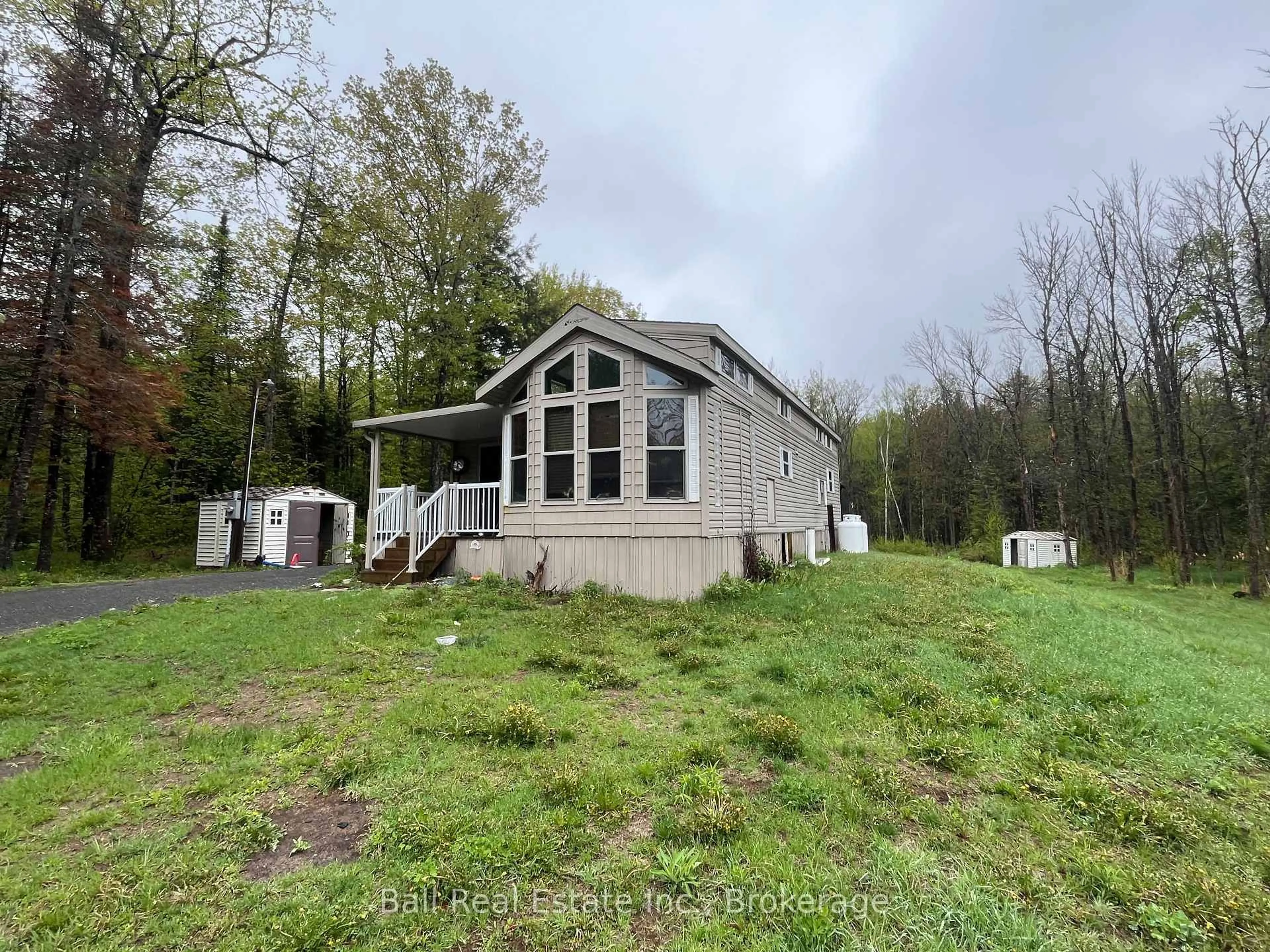 A pic from outside/outdoor area/front of a property/back of a property/a pic from drone, water/lake/river/ocean view for 1594 North Steenburg Lake Rd, Coe Hill Ontario K0L 1P0