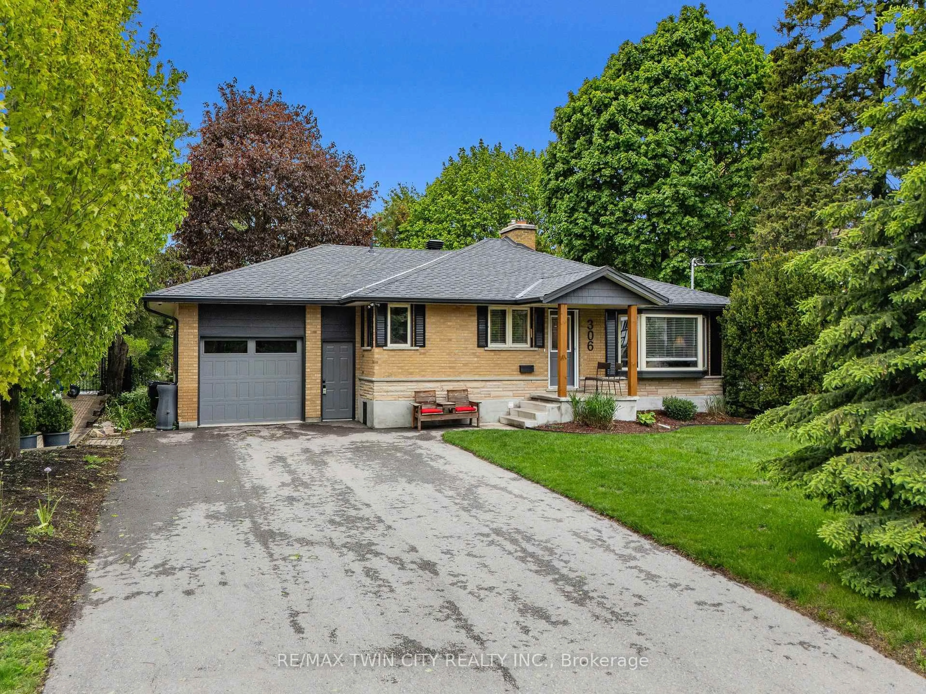 Home with brick exterior material, street for 306 Normandy Ave, Waterloo Ontario N2K 1X7