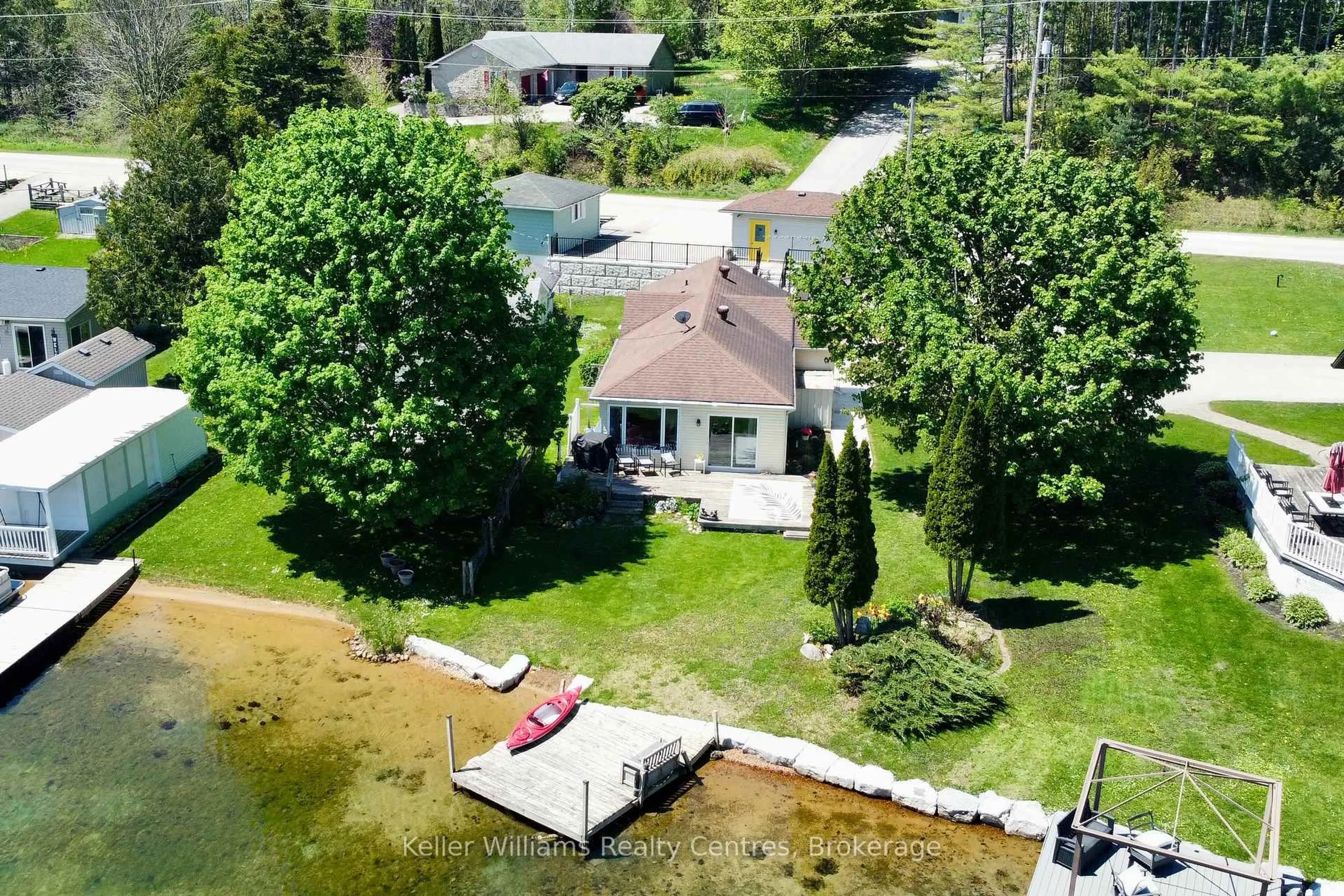 A pic from outside/outdoor area/front of a property/back of a property/a pic from drone, water/lake/river/ocean view for 419 Lake Rosalind Road 4, Brockton Ontario N4N 3B9