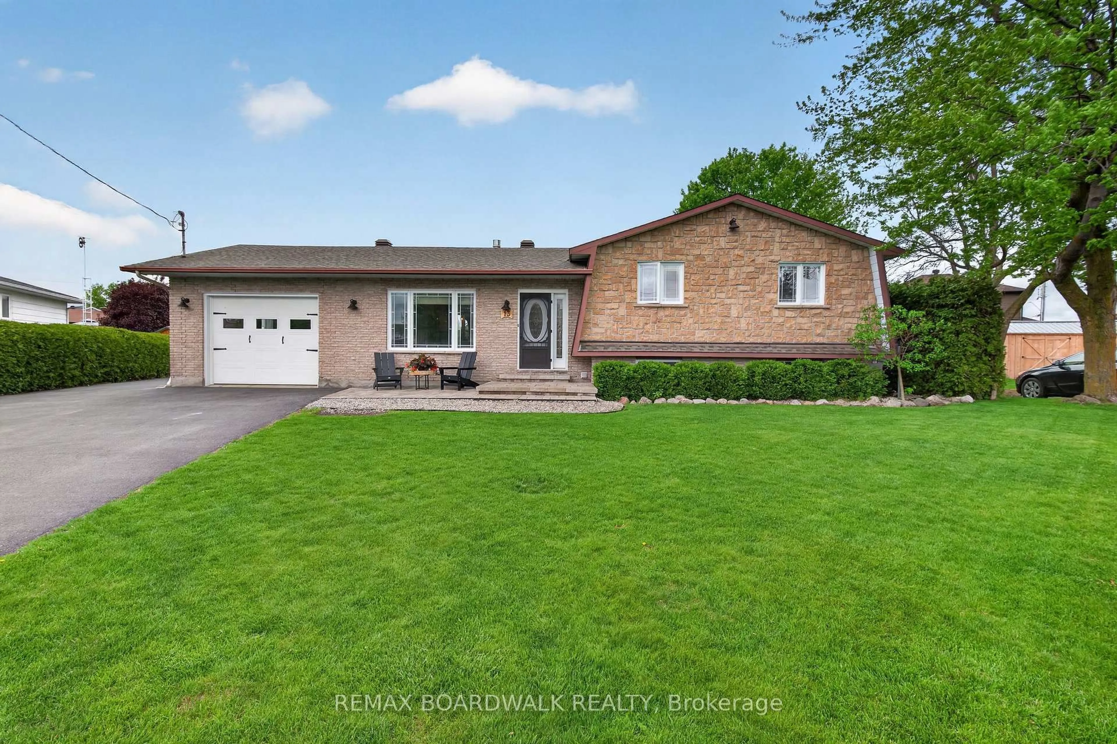 Home with brick exterior material, street for 13 Alice St, Casselman Ontario K0A 1M0