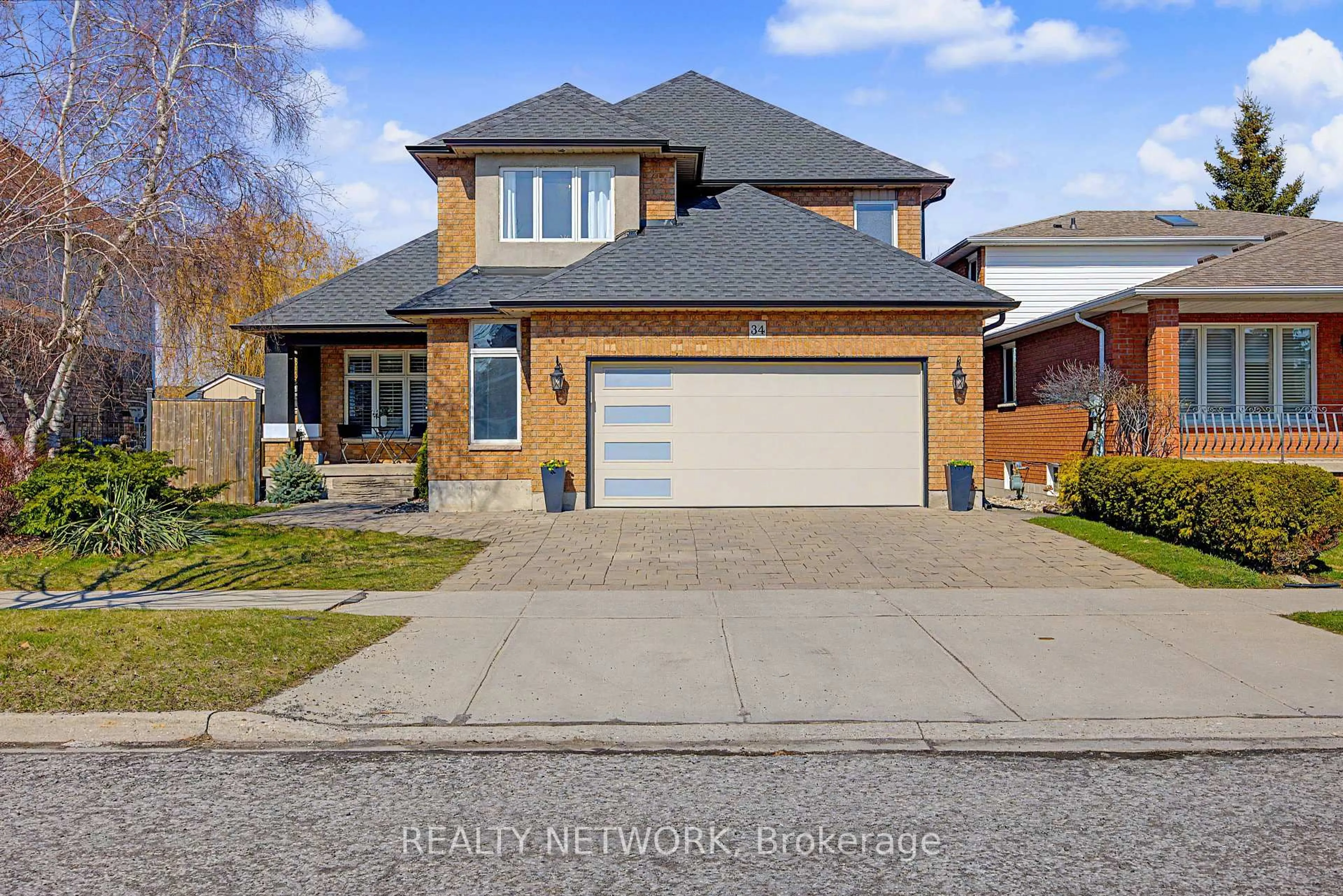 Home with brick exterior material, street for 34 Highbury Dr, Hamilton Ontario L8J 2T4