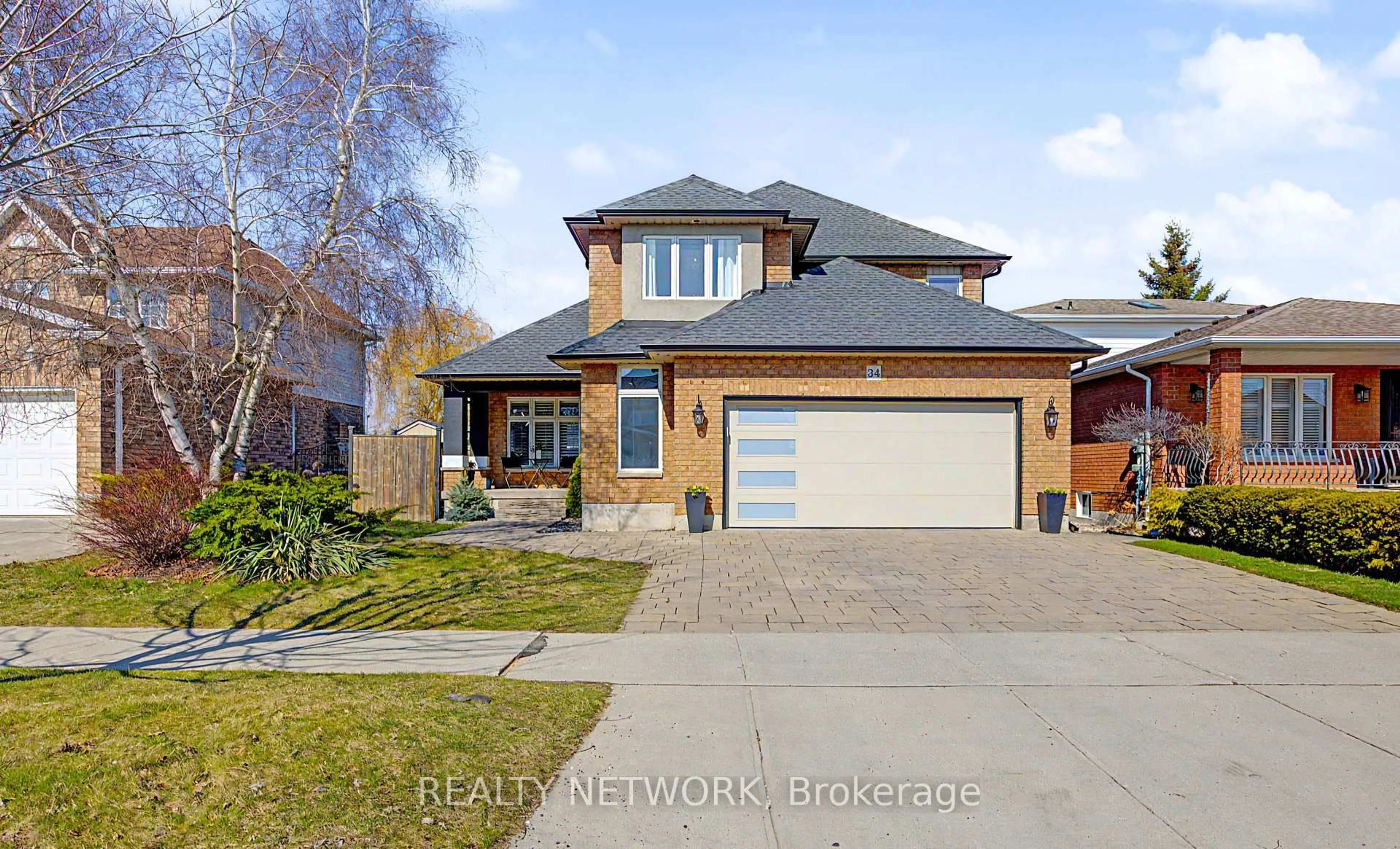 Home with brick exterior material, street for 34 Highbury Dr, Hamilton Ontario L8J 2T4
