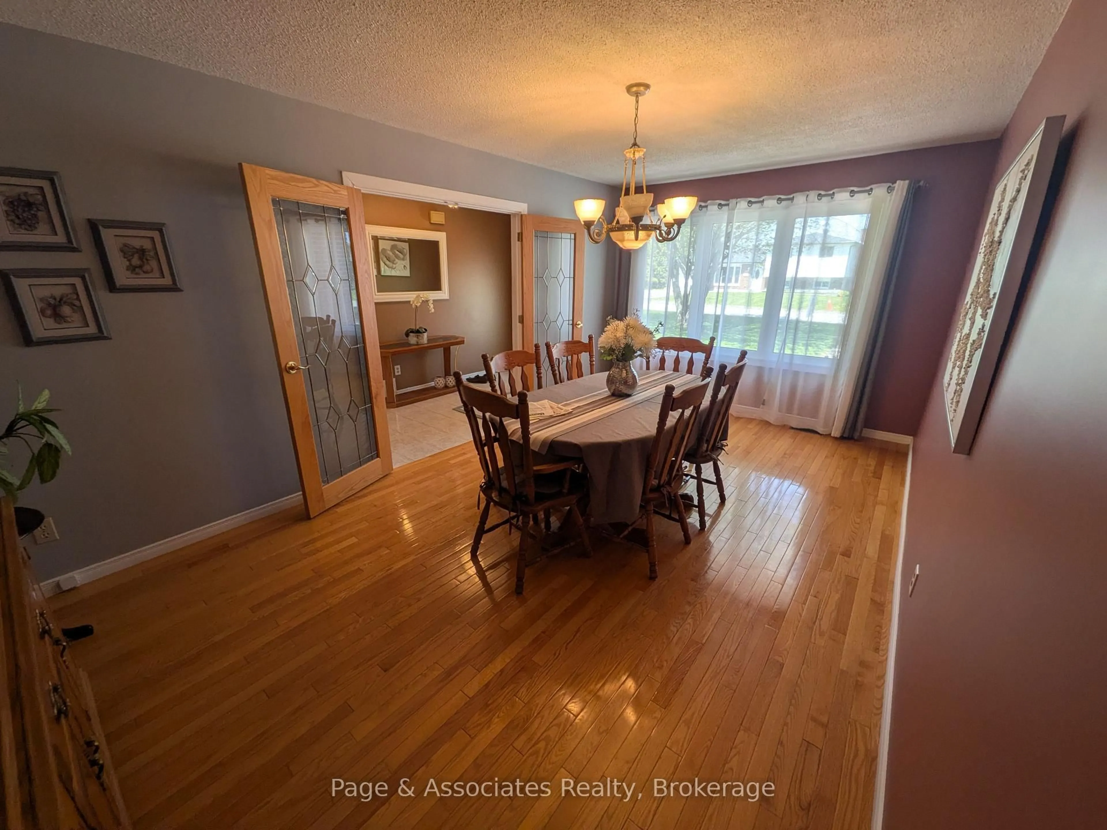 Dining room, wood/laminate floor for 174 Bourgault St, West Nipissing Ontario P2B 1T9