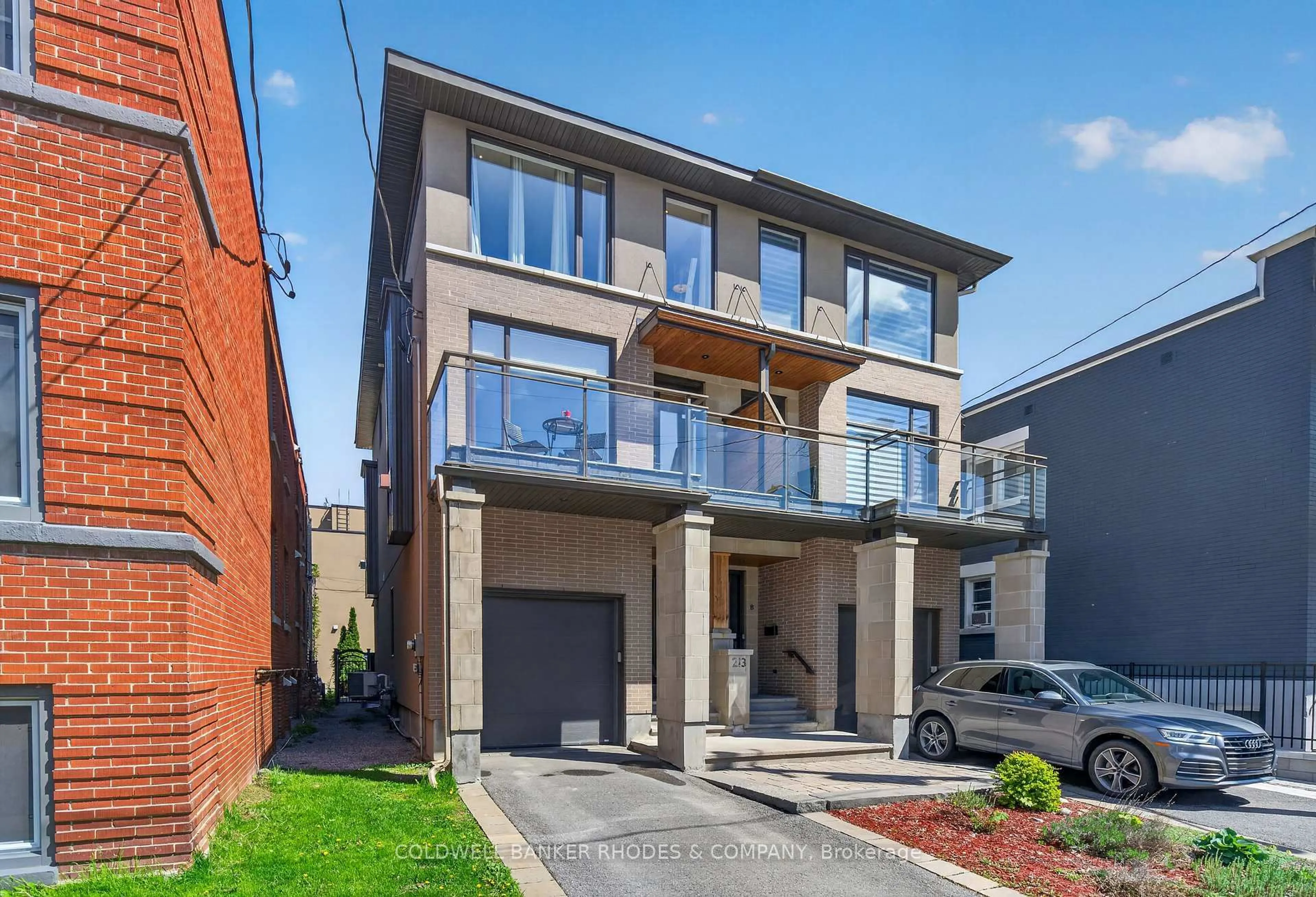 Home with brick exterior material, street for 213 Ivy Cres #A, Ottawa Ontario K1M 1X9