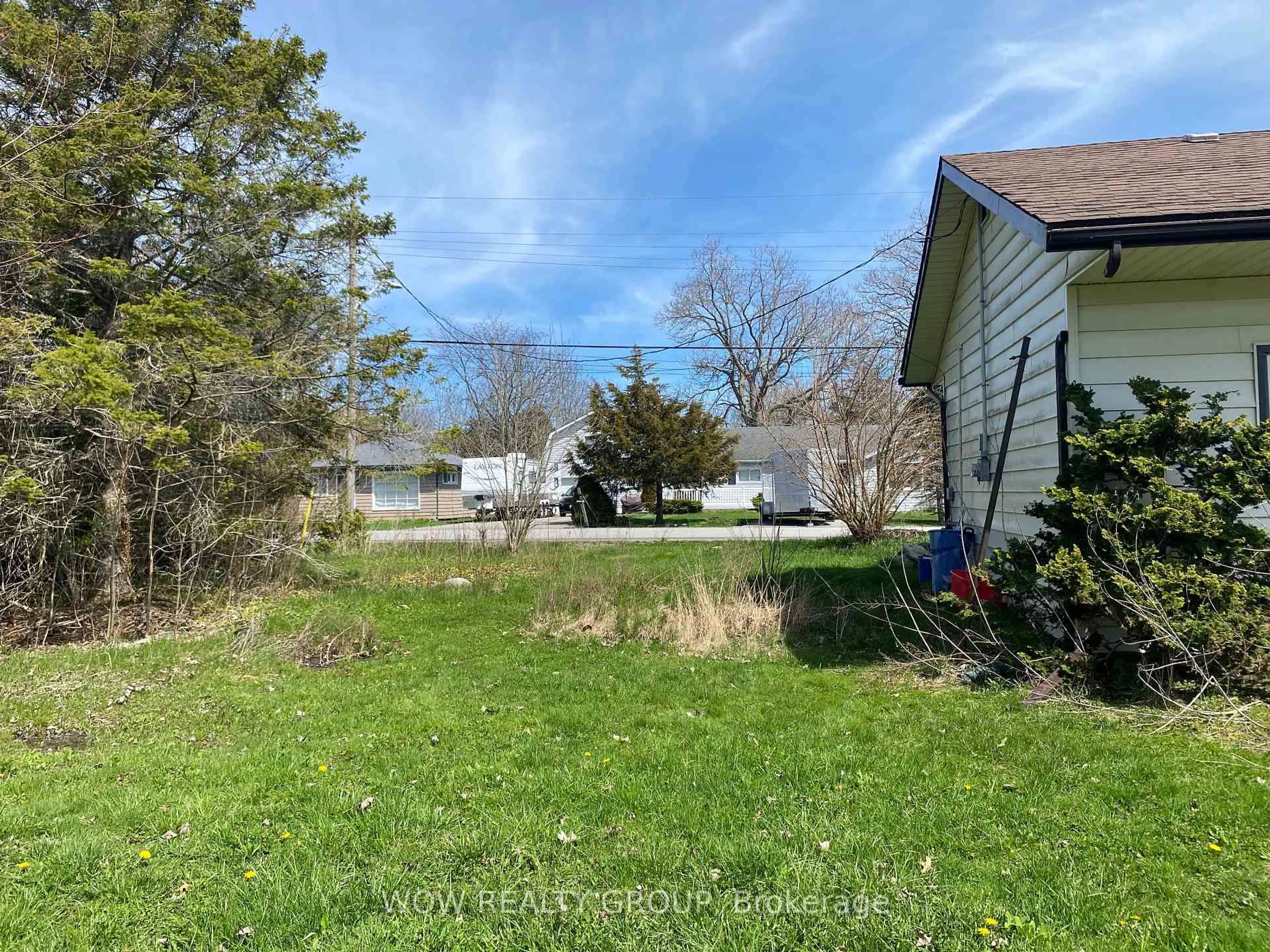 A pic from outside/outdoor area/front of a property/back of a property/a pic from drone, unknown for 11652 Belleview Beach Rd, Wainfleet Ontario L0S 1V0