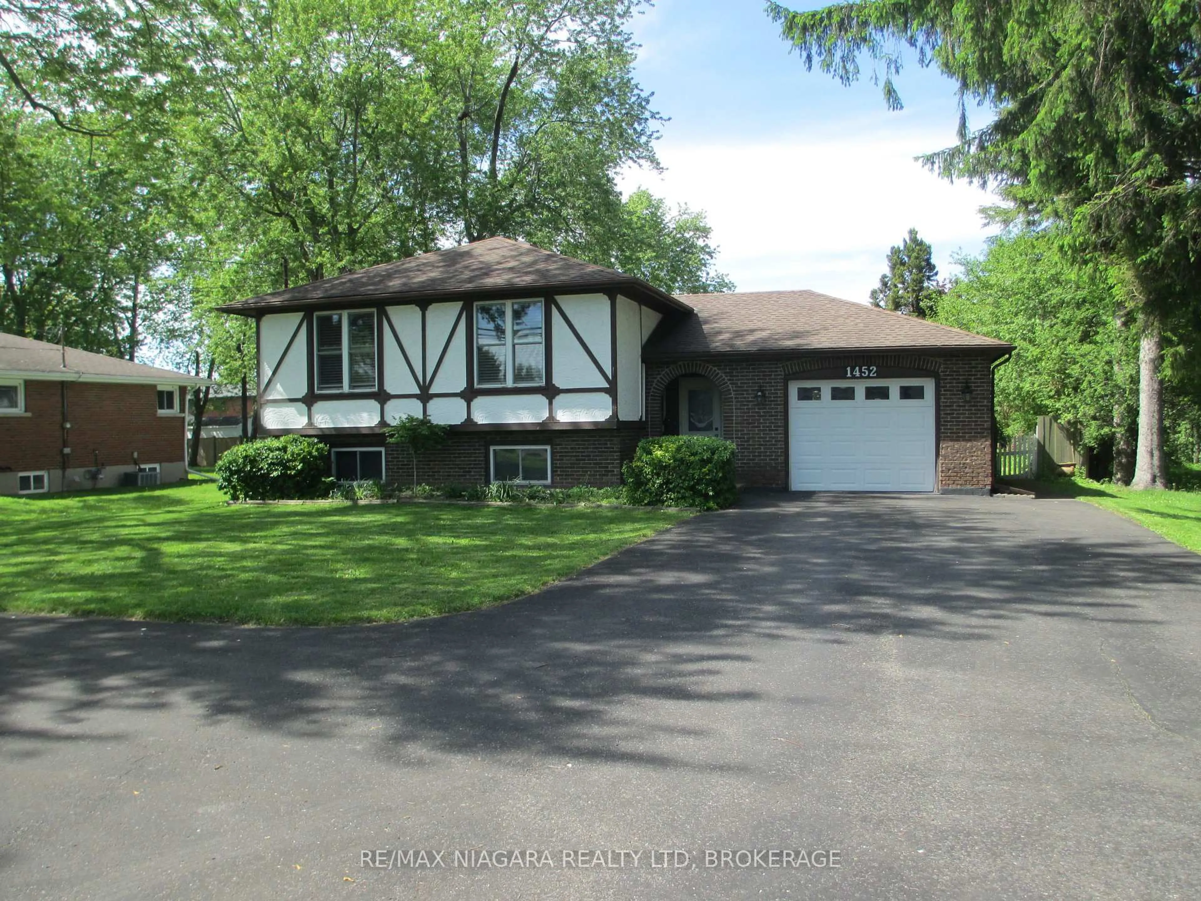 Home with vinyl exterior material, street for 1452 Garrison Rd, Fort Erie Ontario L2A 1P6