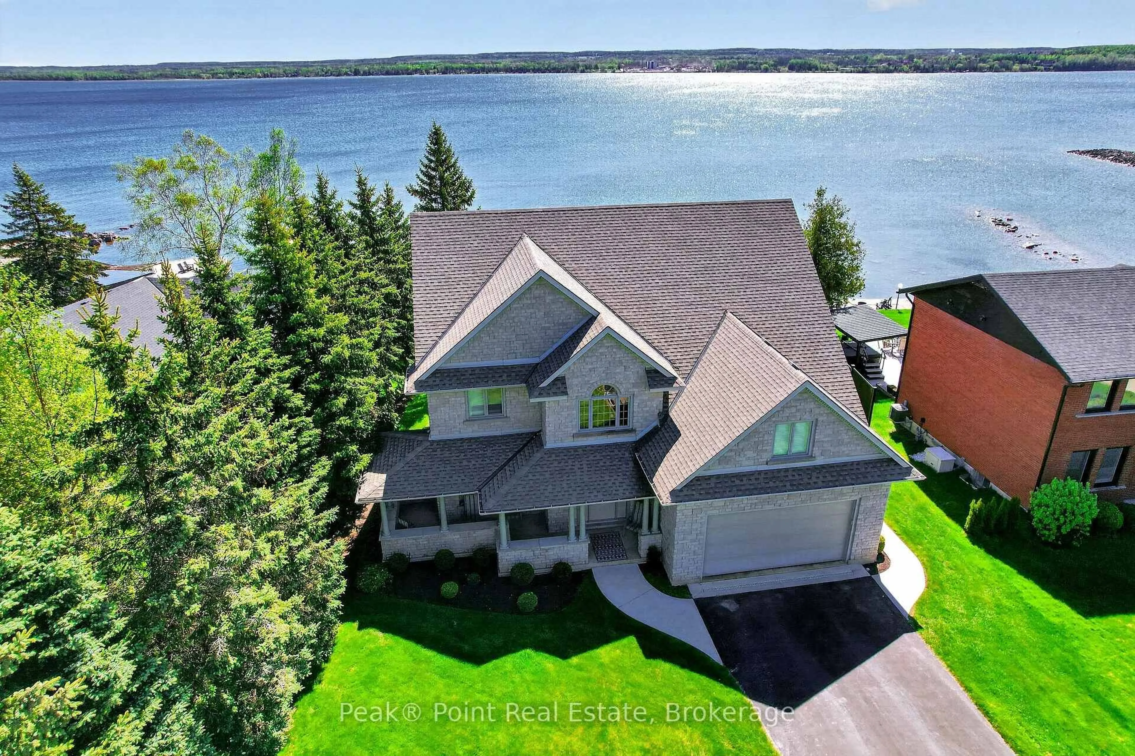 A pic from outside/outdoor area/front of a property/back of a property/a pic from drone, water/lake/river/ocean view for 318469 Grey #1 Rd, Georgian Bluffs Ontario N4K 5N4