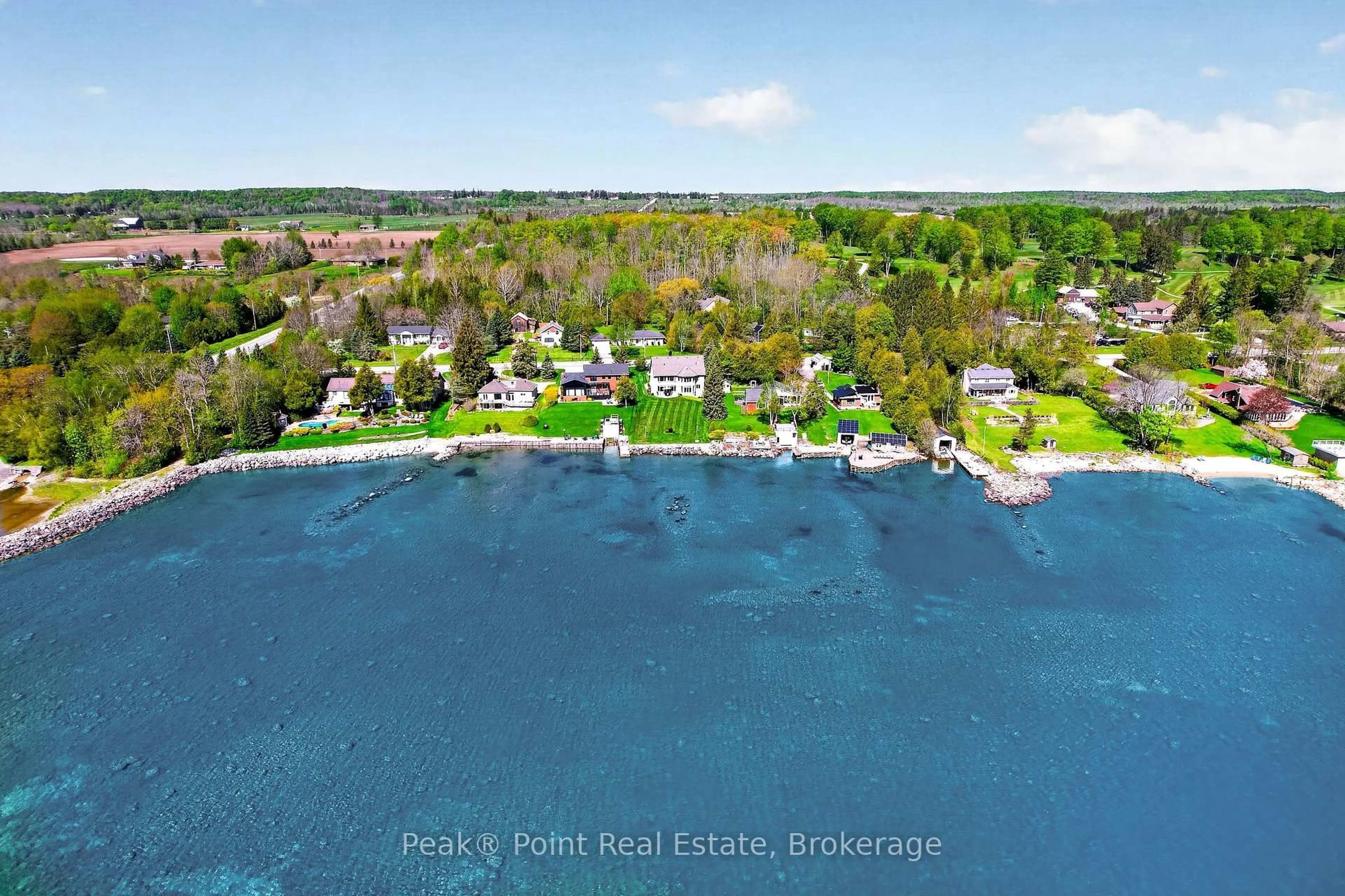 A pic from outside/outdoor area/front of a property/back of a property/a pic from drone, water/lake/river/ocean view for 318469 Grey #1 Rd, Georgian Bluffs Ontario N4K 5N4