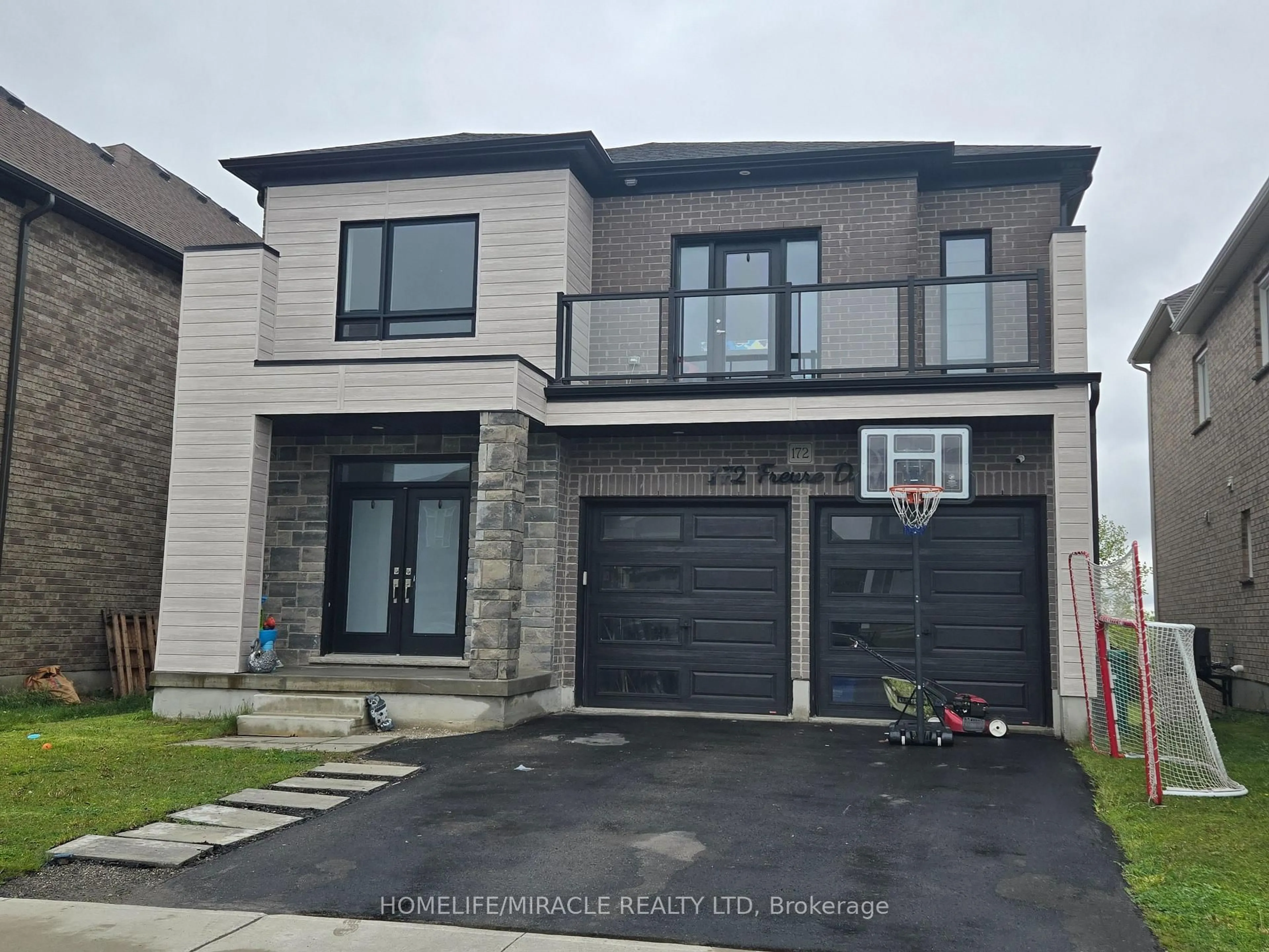 Home with brick exterior material, street for 172 Freure Dr, Cambridge Ontario N1S 0A2