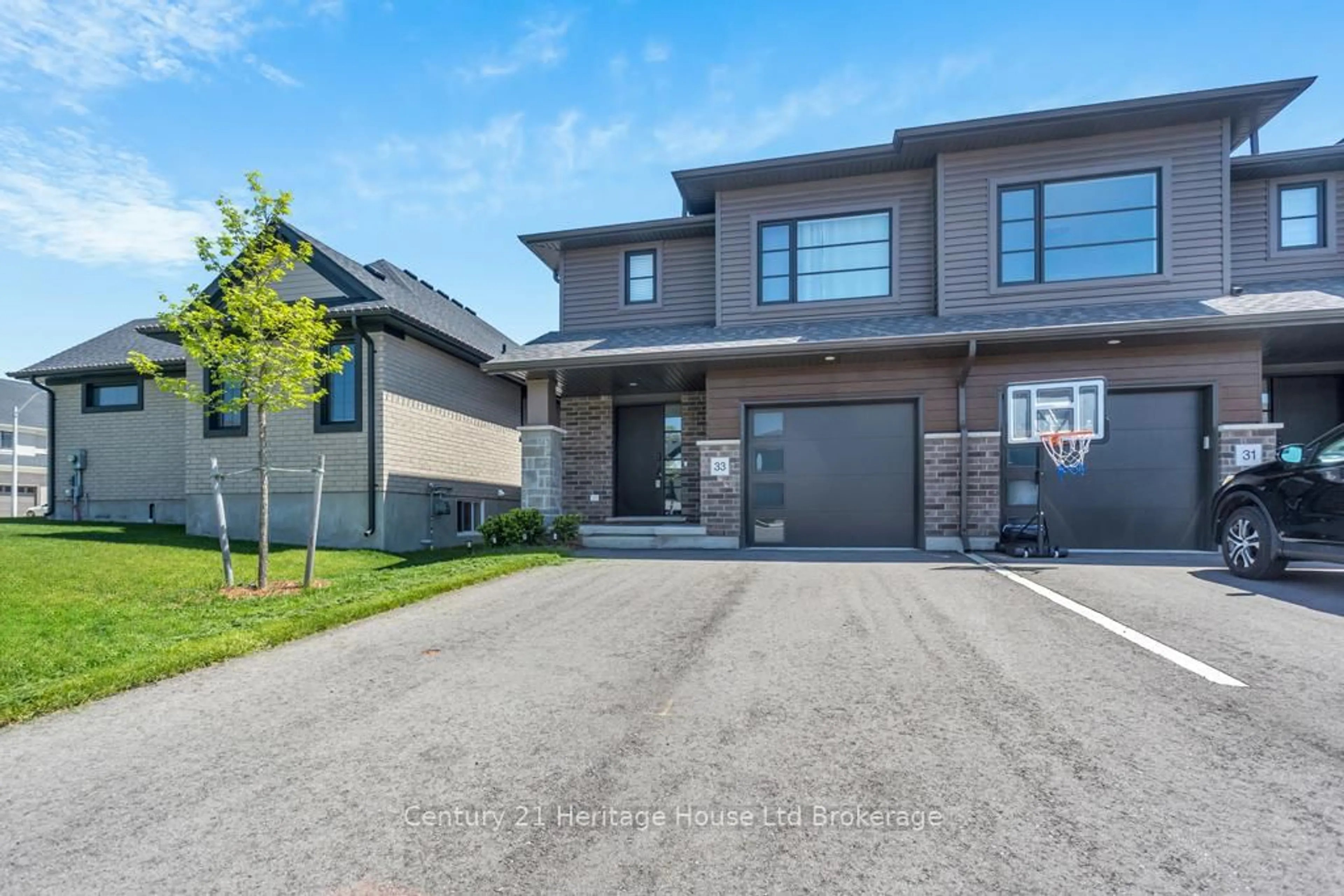 Home with brick exterior material, street for 33 Martin St, Tillsonburg Ontario N4G 0K3