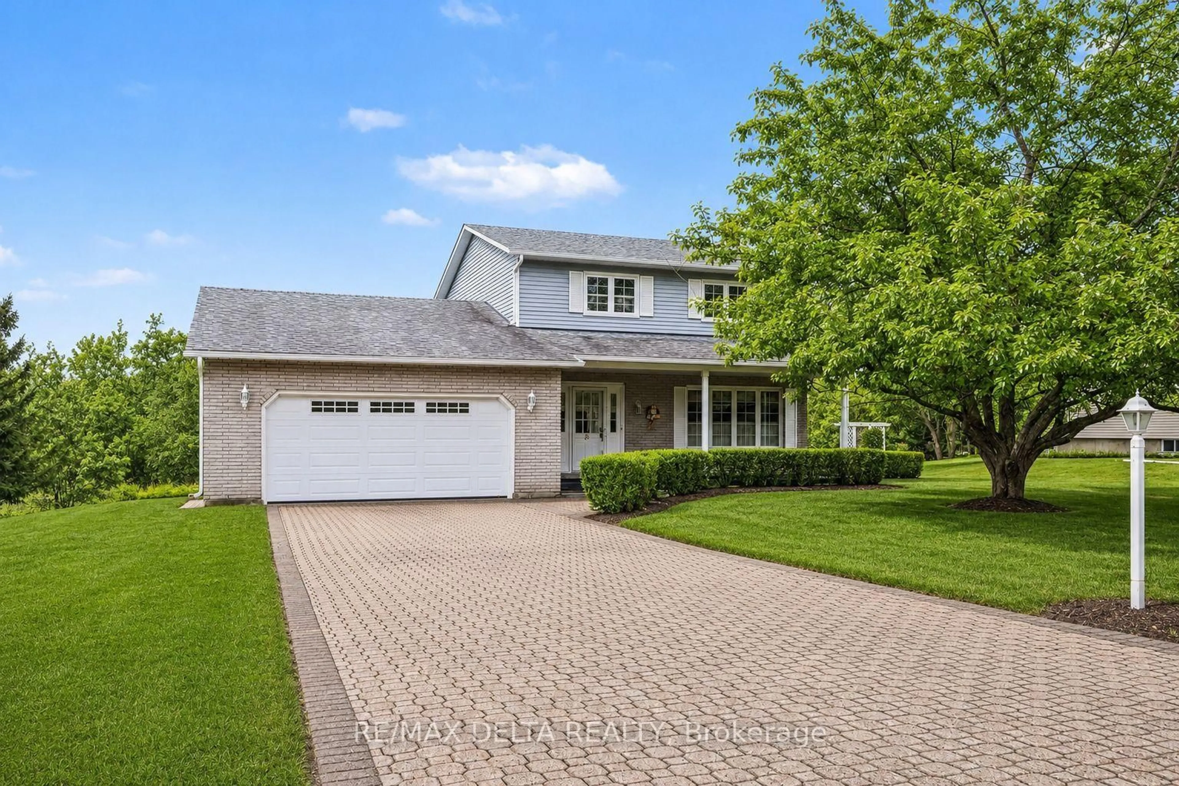 Home with vinyl exterior material, street for 10532 Main St, North Dundas Ontario K0E 1W0