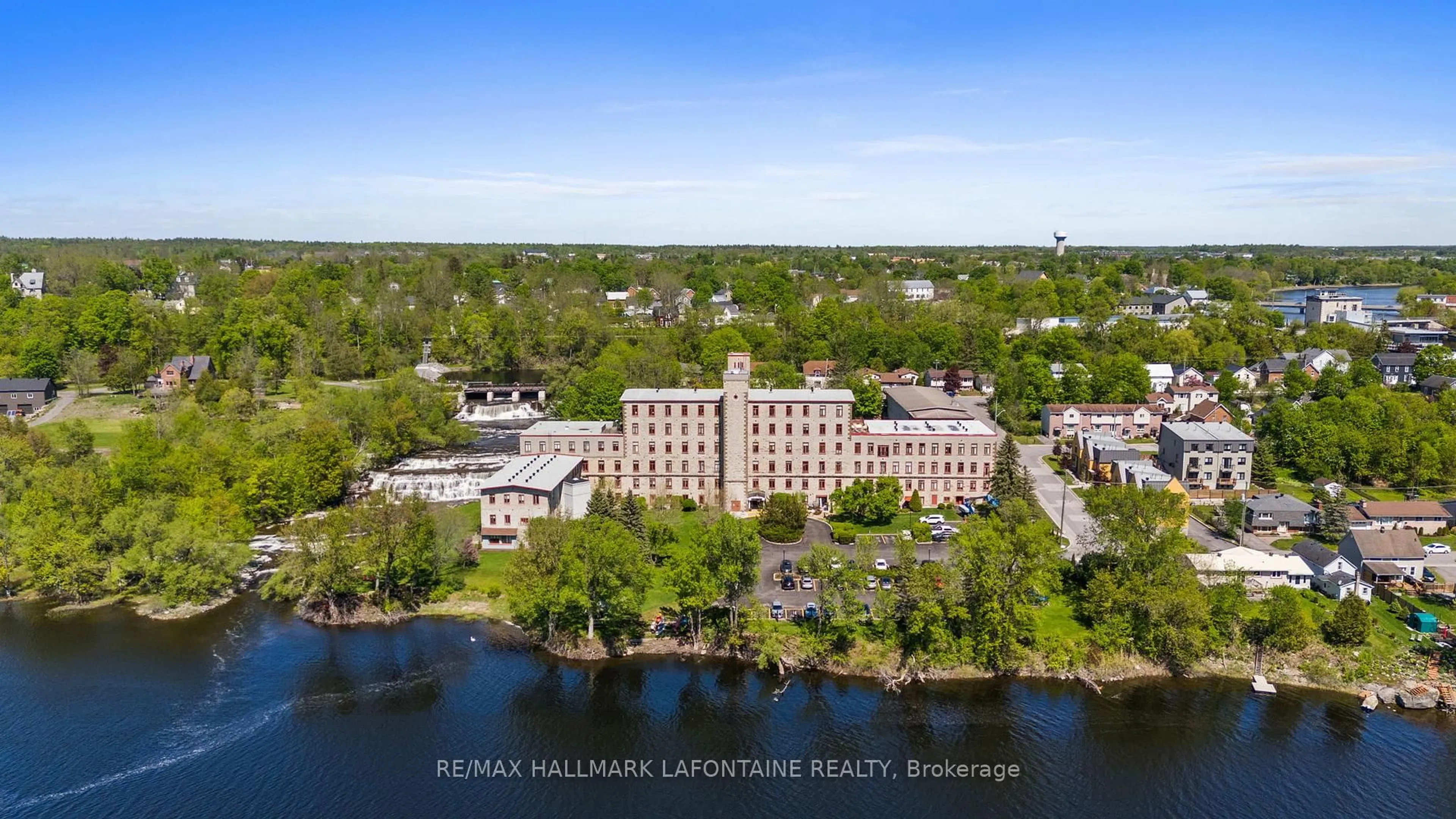 A pic from outside/outdoor area/front of a property/back of a property/a pic from drone, water/lake/river/ocean view for 1 Rosamond St #107, Almonte Ontario K0A 1A0