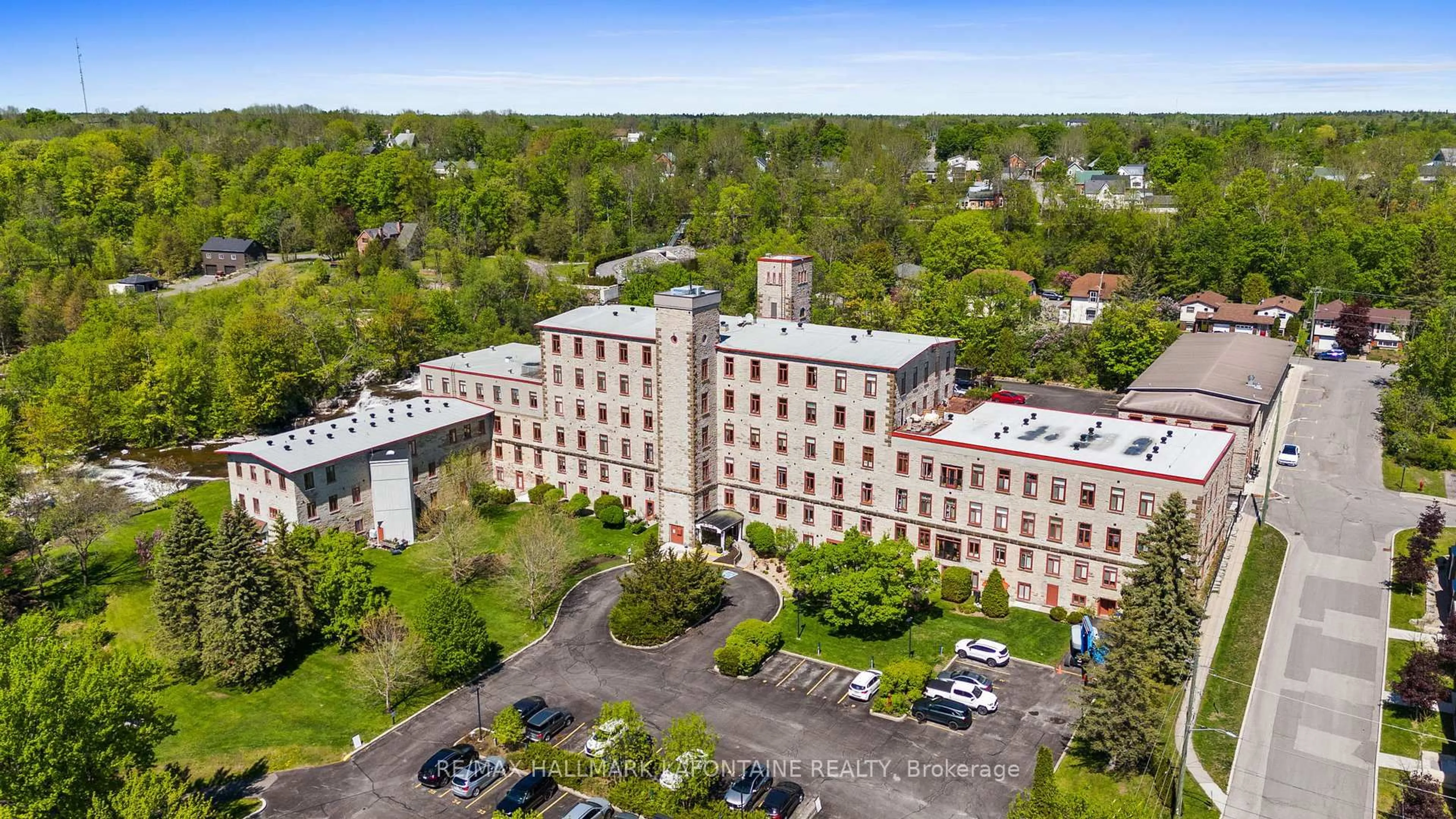 A pic from outside/outdoor area/front of a property/back of a property/a pic from drone, building for 1 Rosamond St #107, Almonte Ontario K0A 1A0