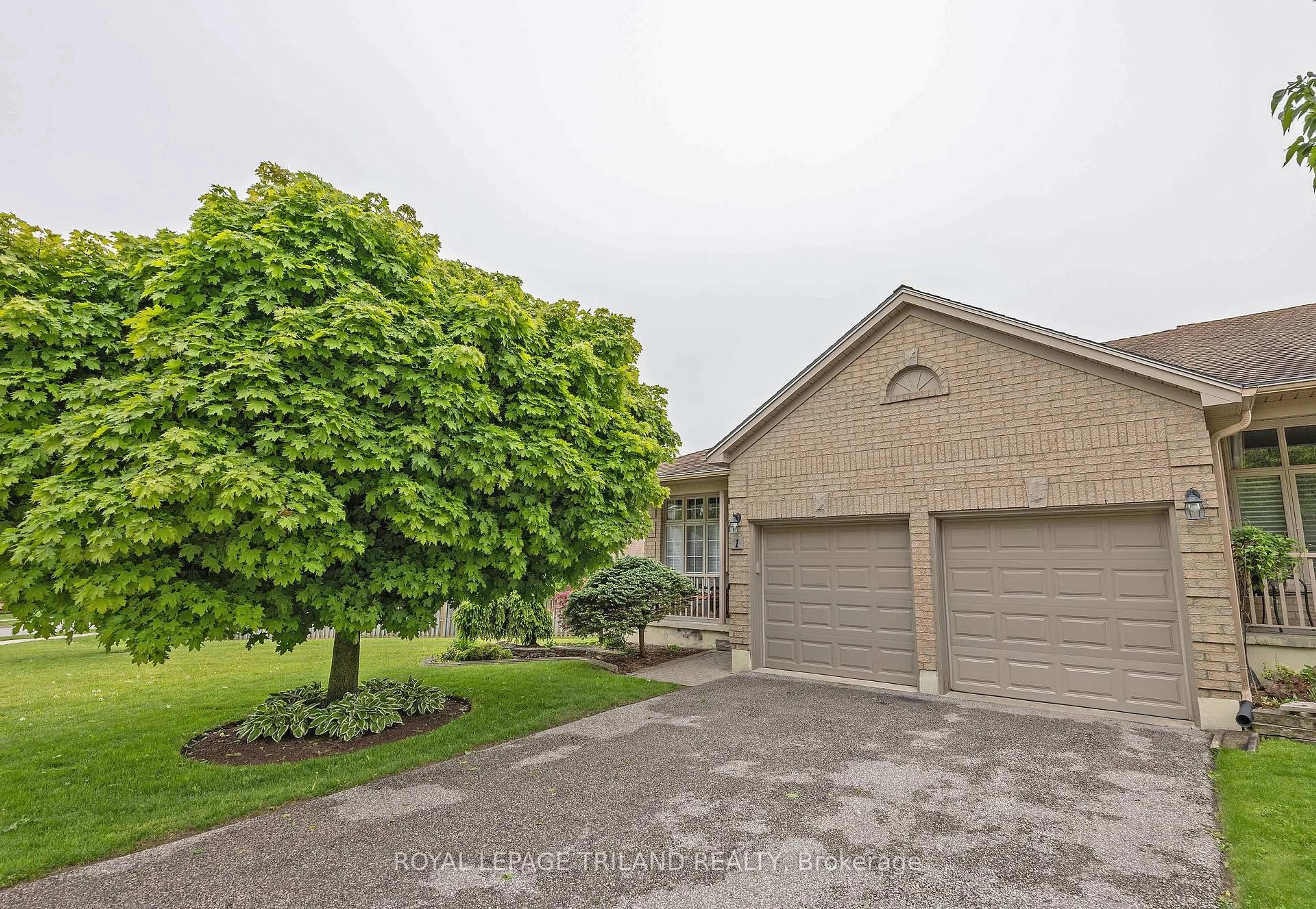 A pic from outside/outdoor area/front of a property/back of a property/a pic from drone, street for 9 Cadeau Terr #1, London South Ontario N6K 4T5