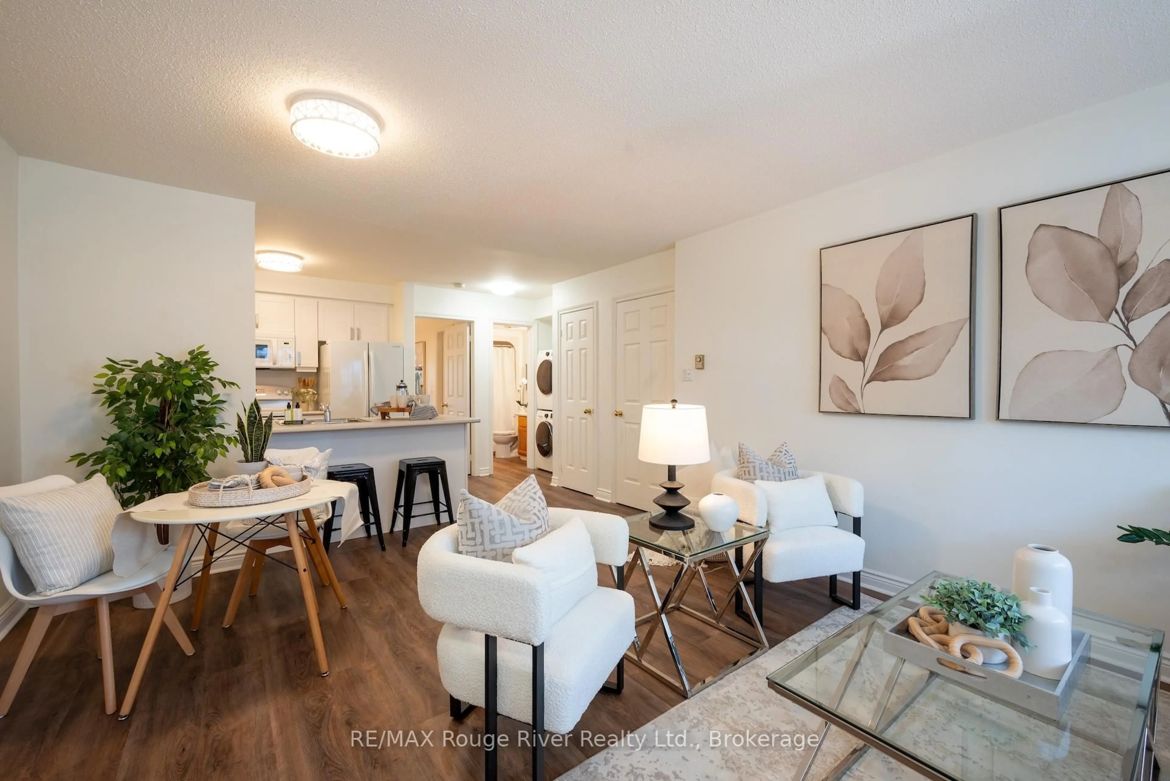 Living room with furniture, wood/laminate floor for 182 D'arcy St #C-103, Cobourg Ontario K9A 5H9