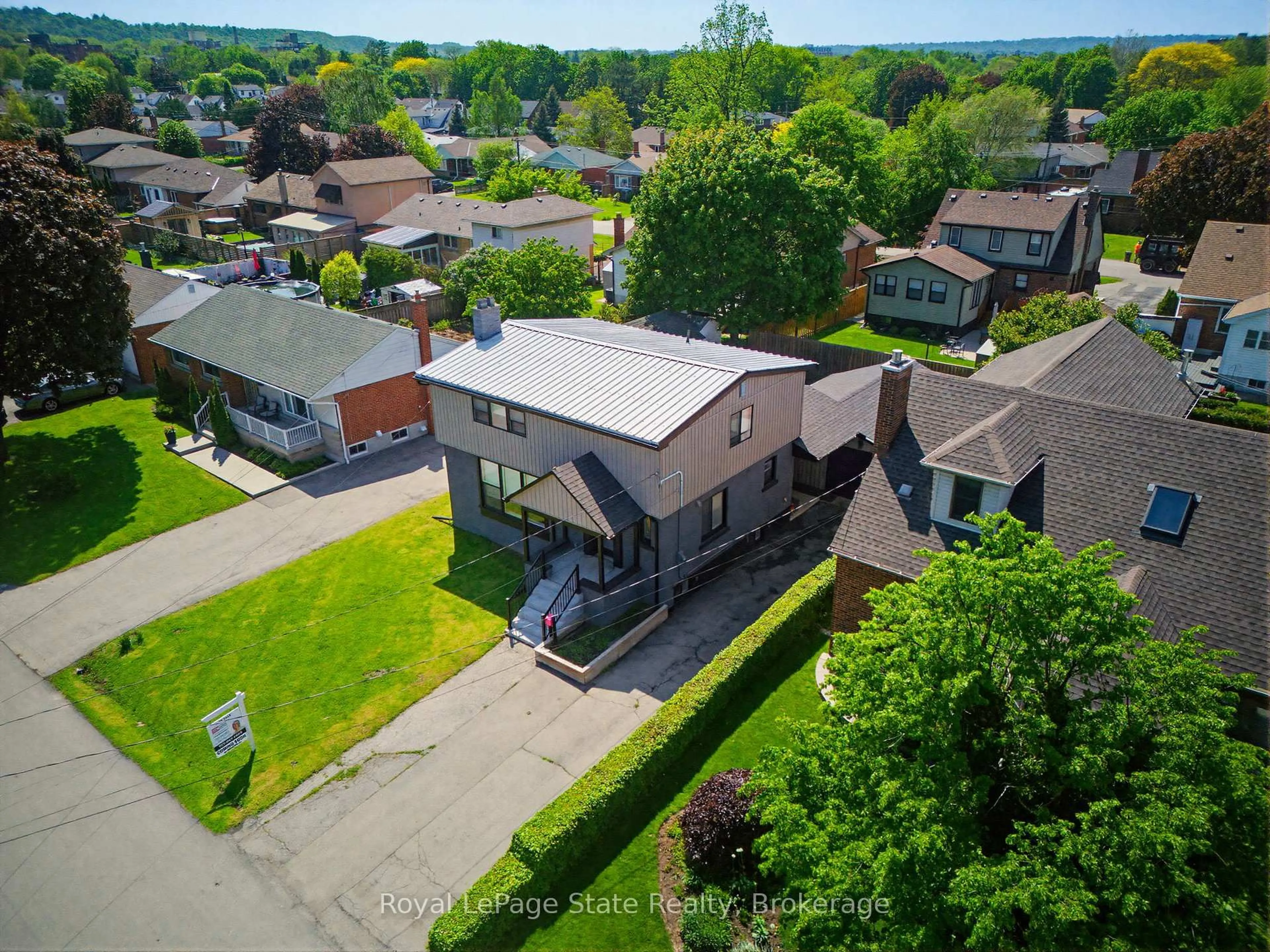 A pic from outside/outdoor area/front of a property/back of a property/a pic from drone, street for 91 First St, Hamilton Ontario L8G 1Y2