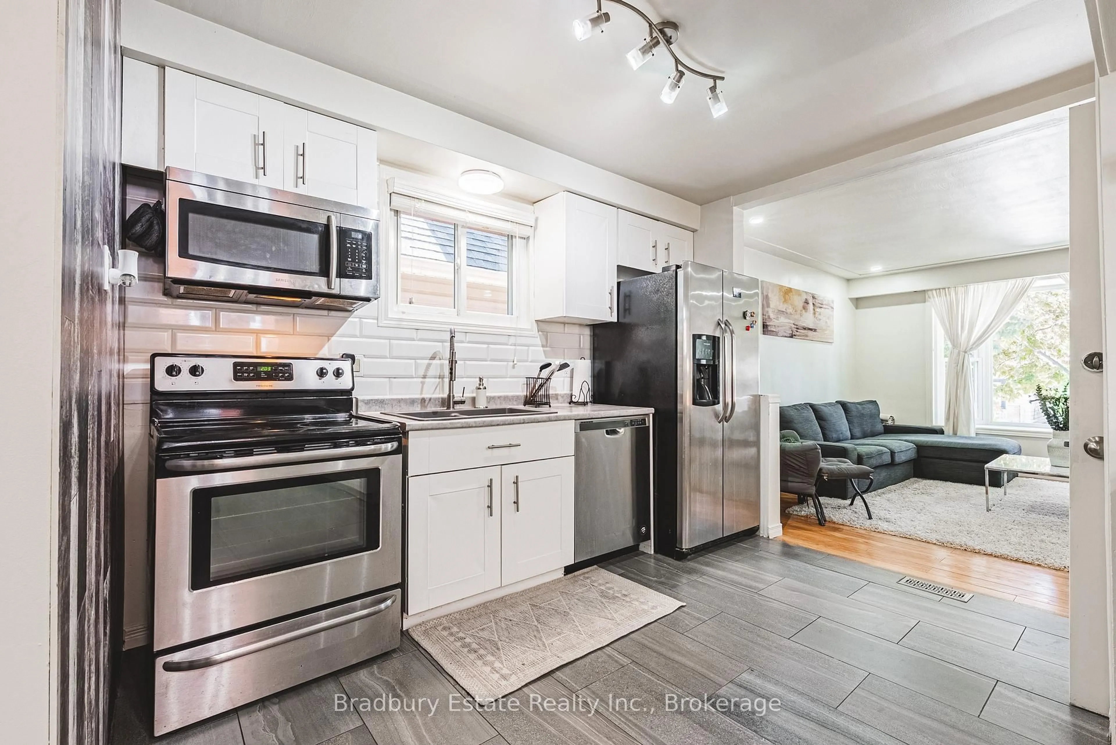 Open concept kitchen, ceramic/tile floor for 13 East 21st St, Hamilton Ontario L8V 2T3