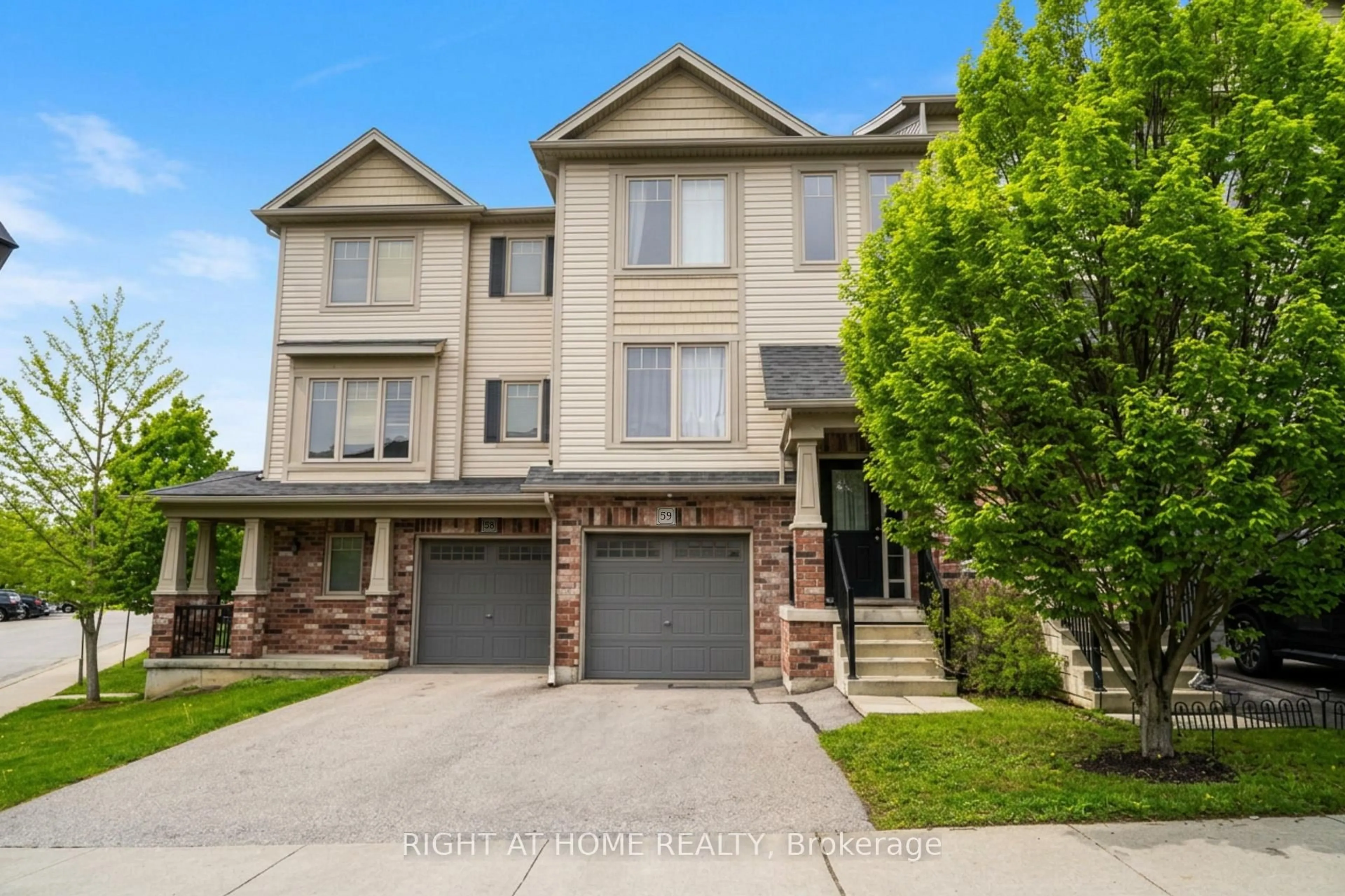 Home with brick exterior material, street for 750 Lawrence St #59, Cambridge Ontario N3H 4A9