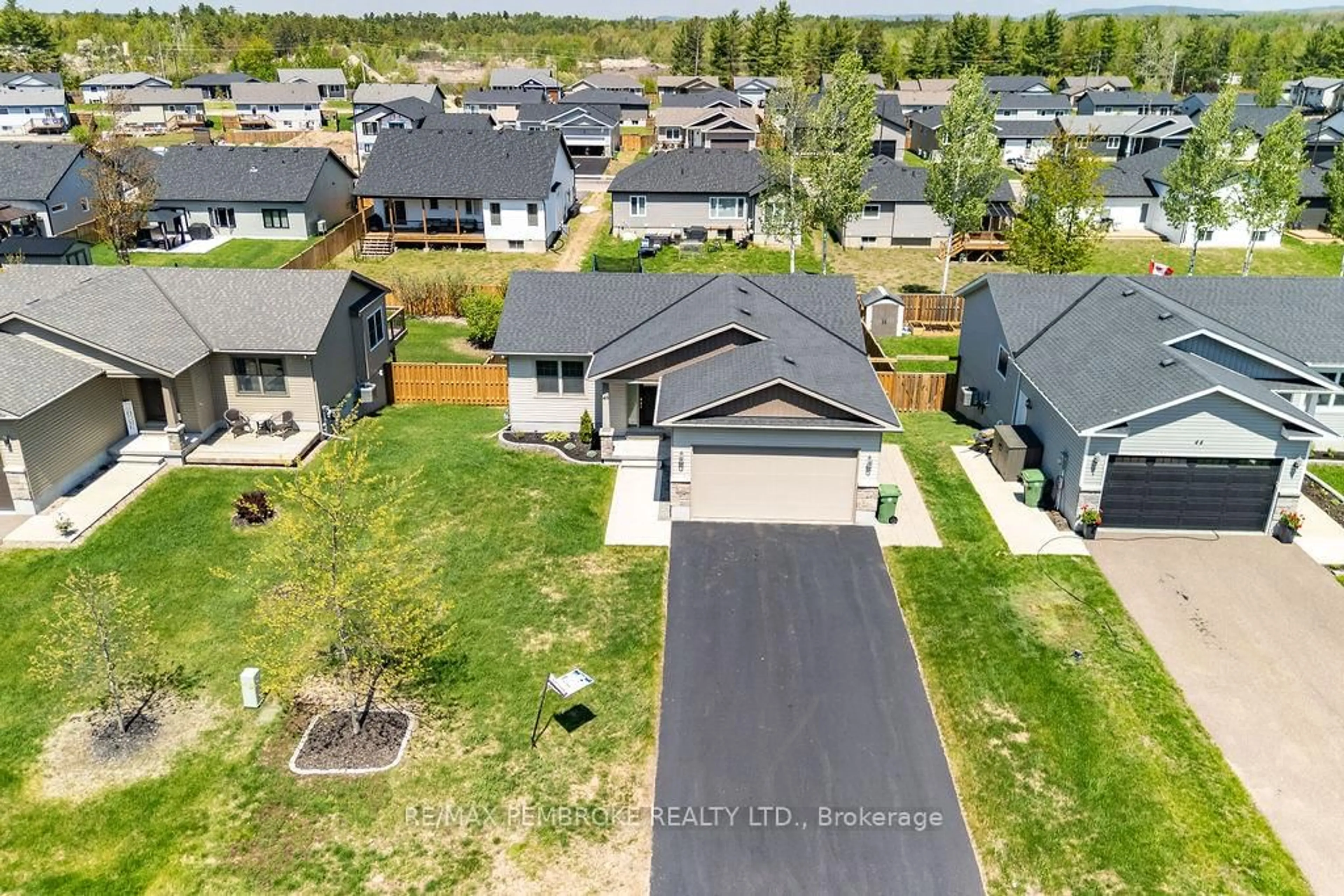 A pic from outside/outdoor area/front of a property/back of a property/a pic from drone, street for 46 Dustin Dr, Petawawa Ontario K8H 0G2