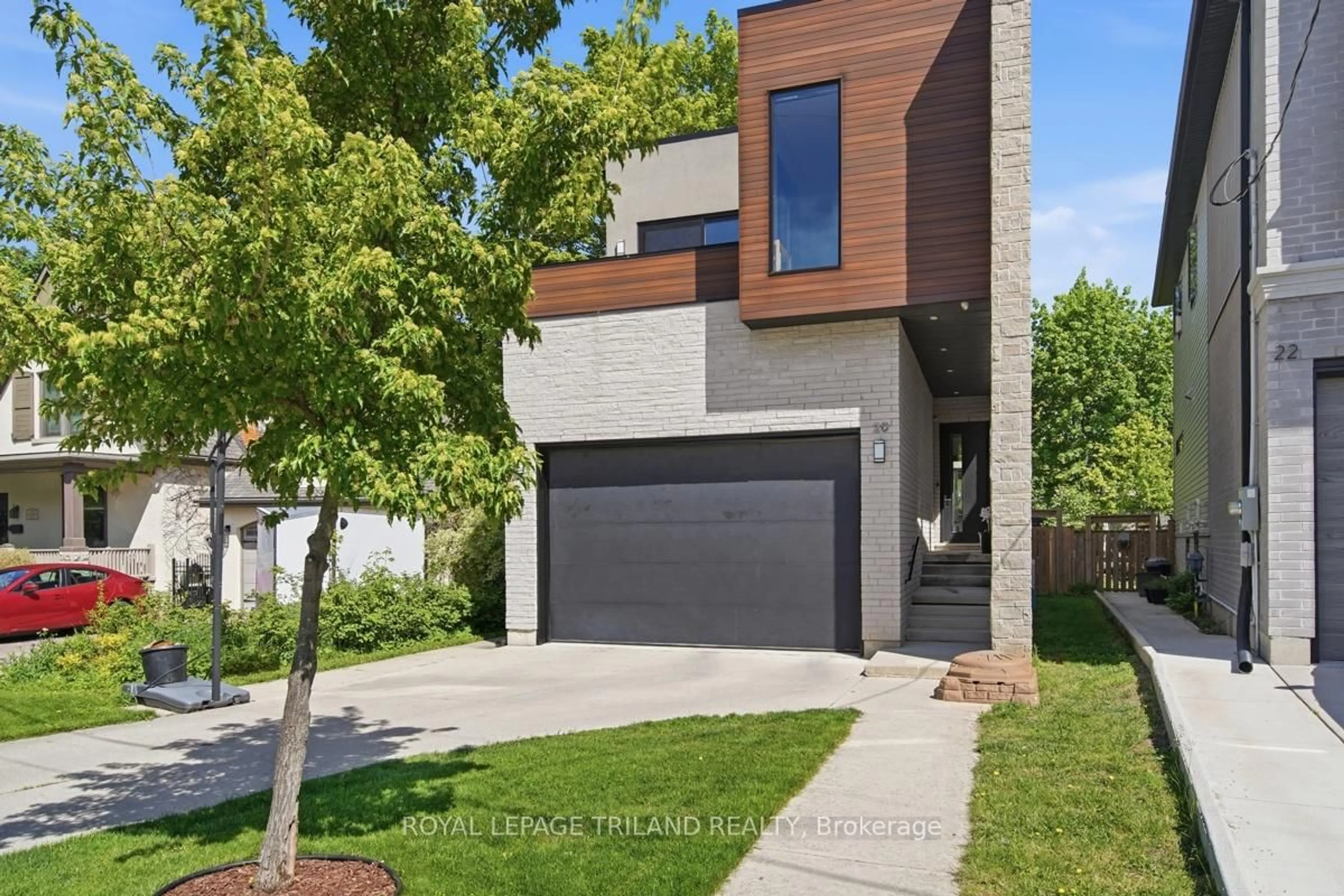 Home with brick exterior material, street for 20 Garfield Ave, London South Ontario N6C 2B5