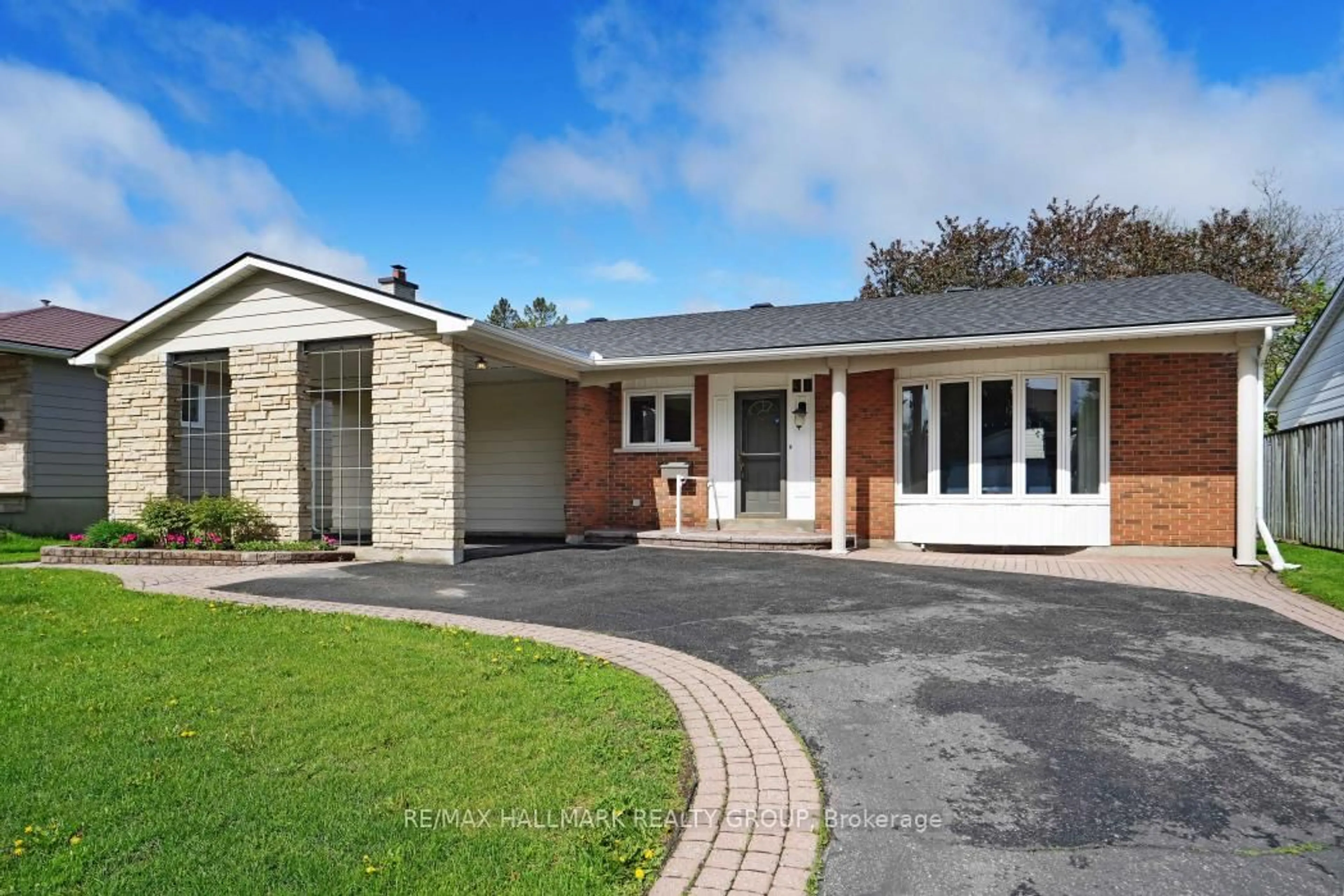 Home with brick exterior material, street for 39 Parkwood Cres, Ottawa Ontario K1B 3J5